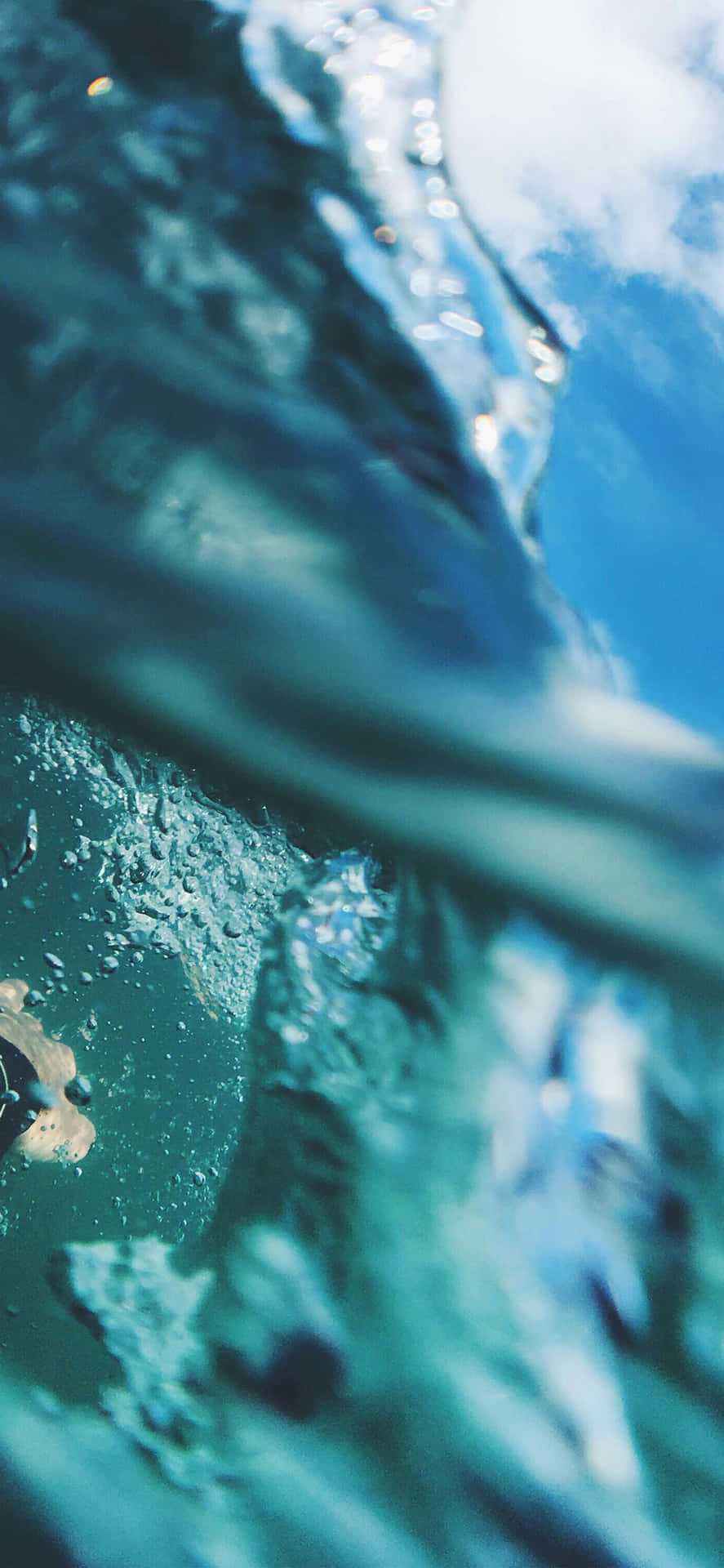 A Man Is Swimming In The Water Background