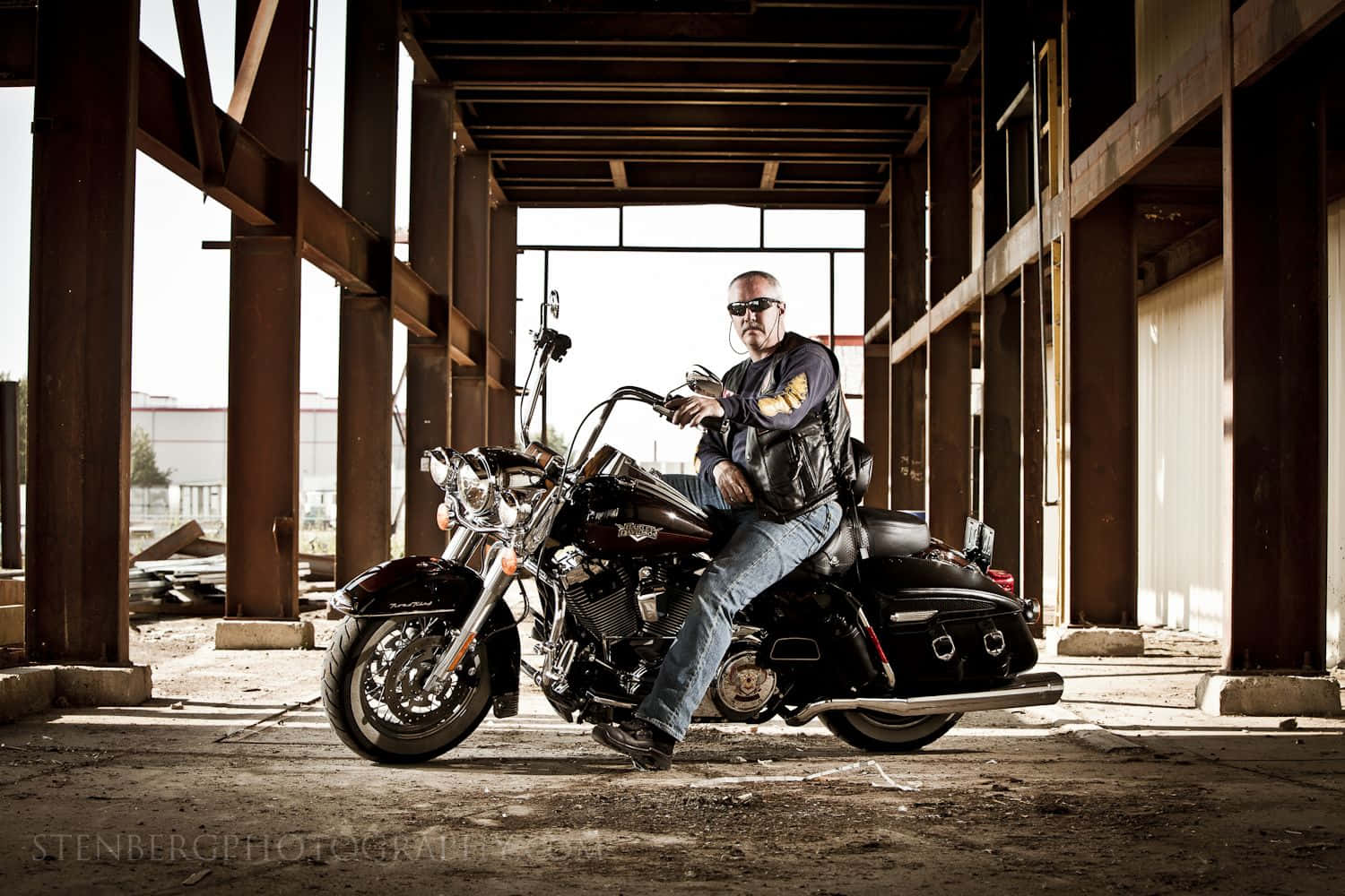 A Man On A Motorcycle Background
