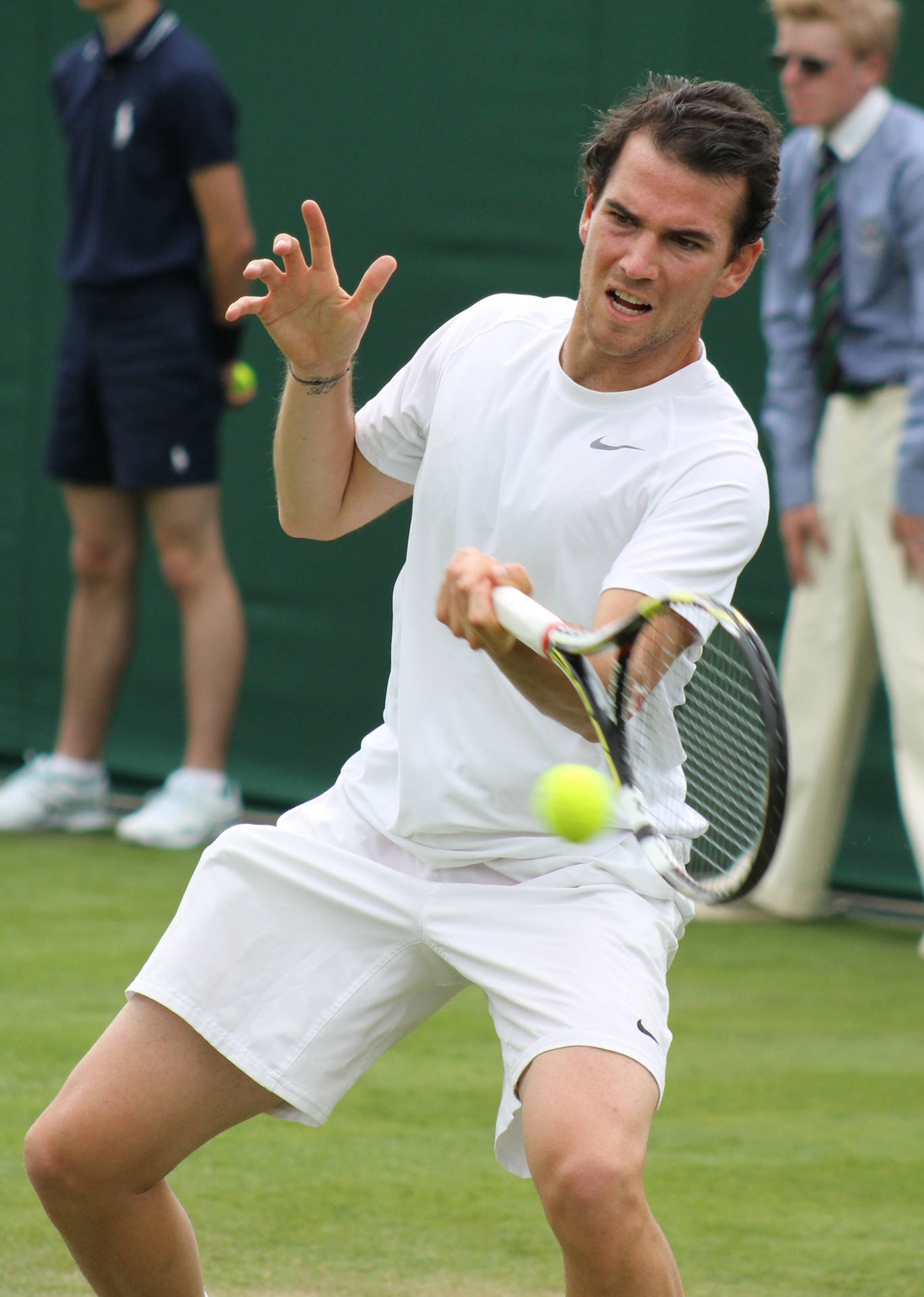 A Man Playing Tennis Background