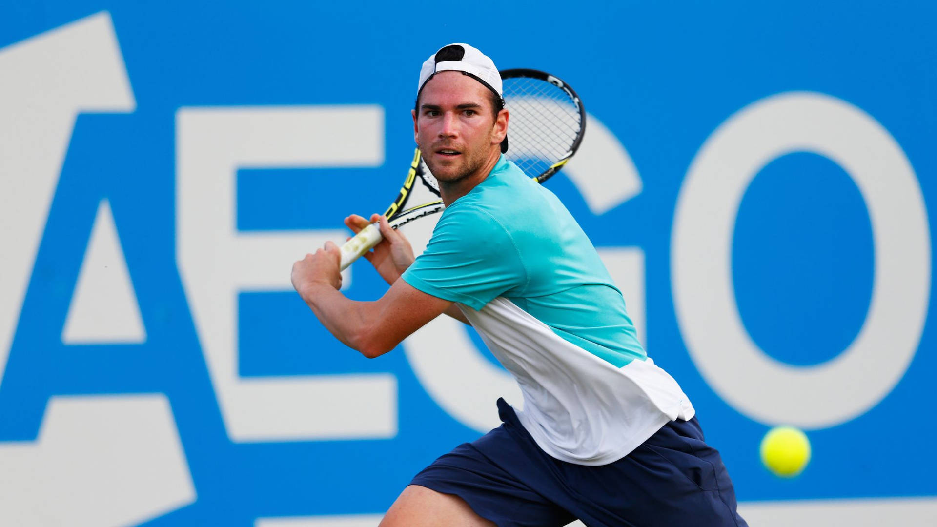 A Man Playing Tennis