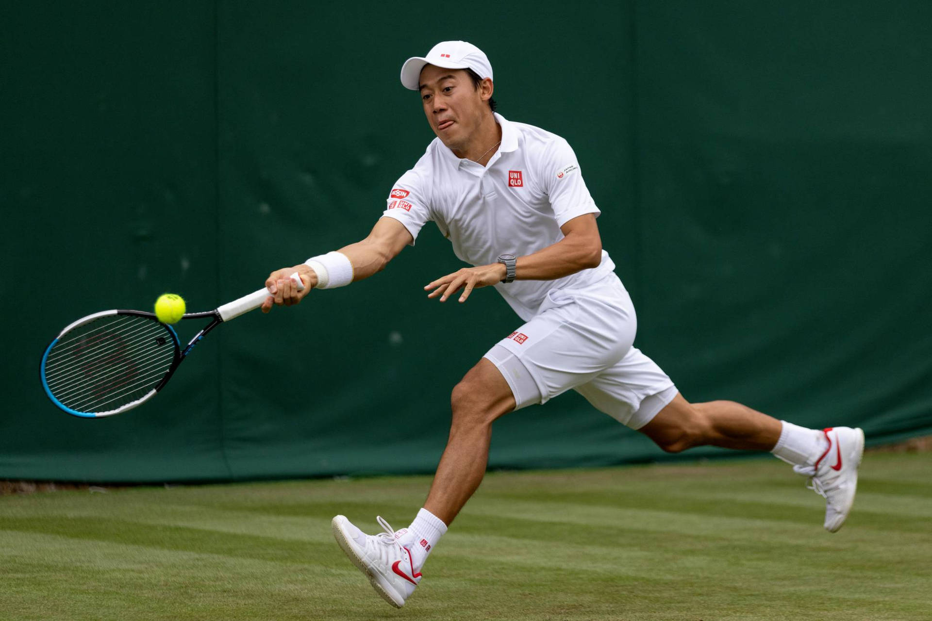 A Man Playing Tennis Background