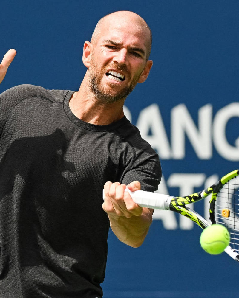 A Man Playing Tennis