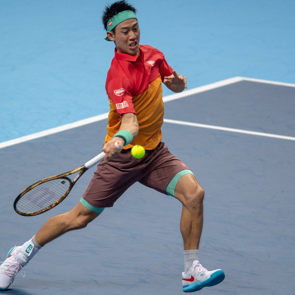 A Man Playing Tennis On A Court Background