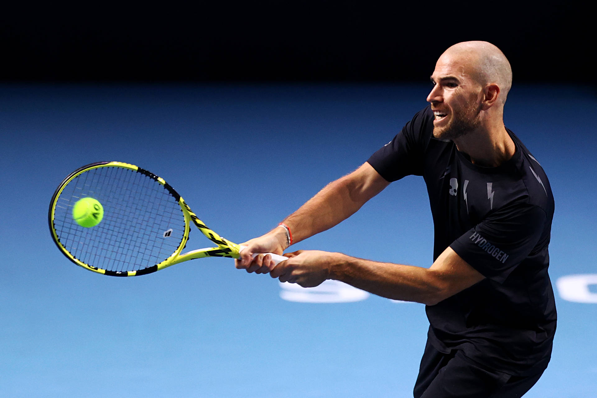 A Man Playing Tennis