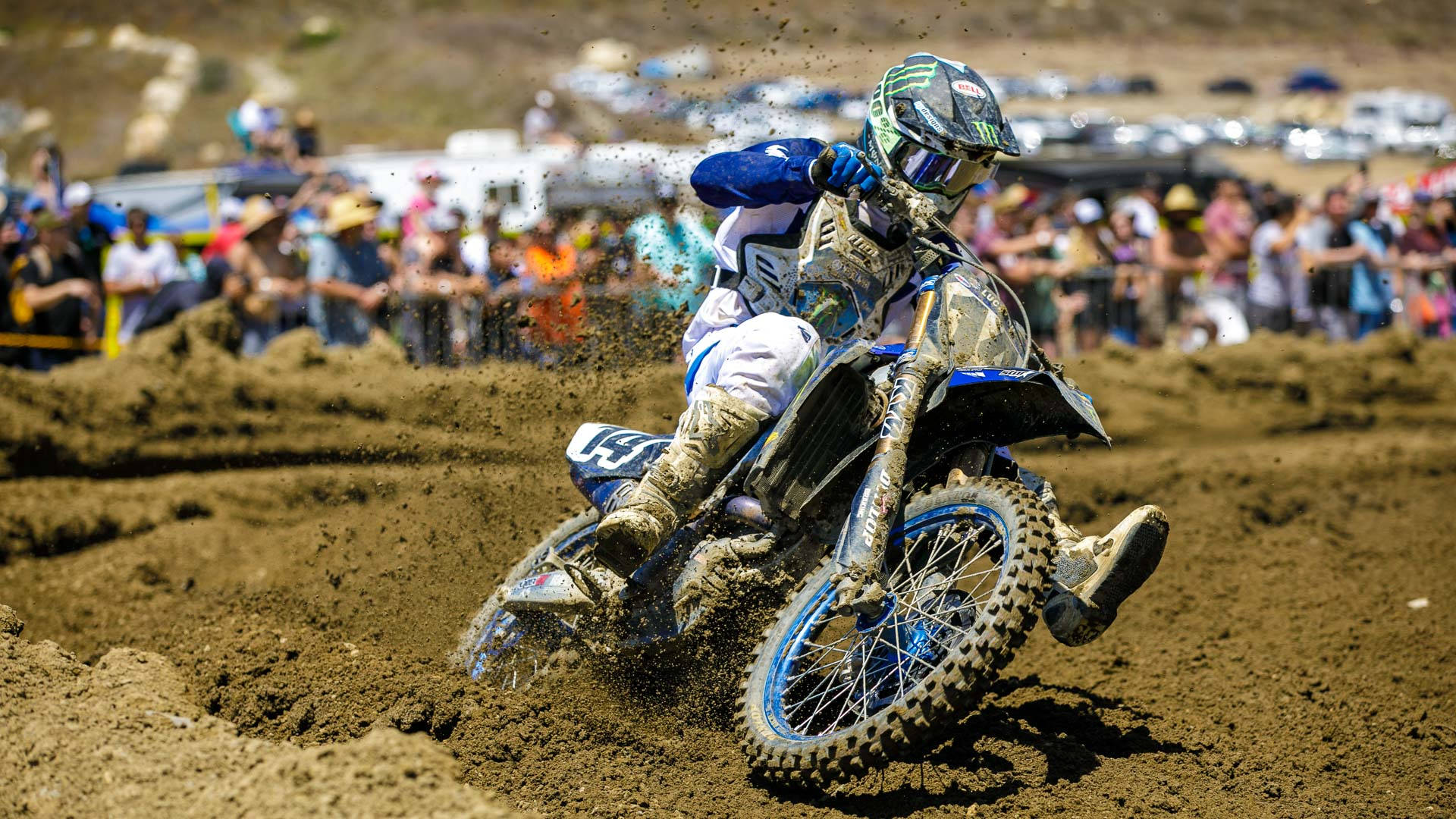 A Man Riding A Dirt Bike Background