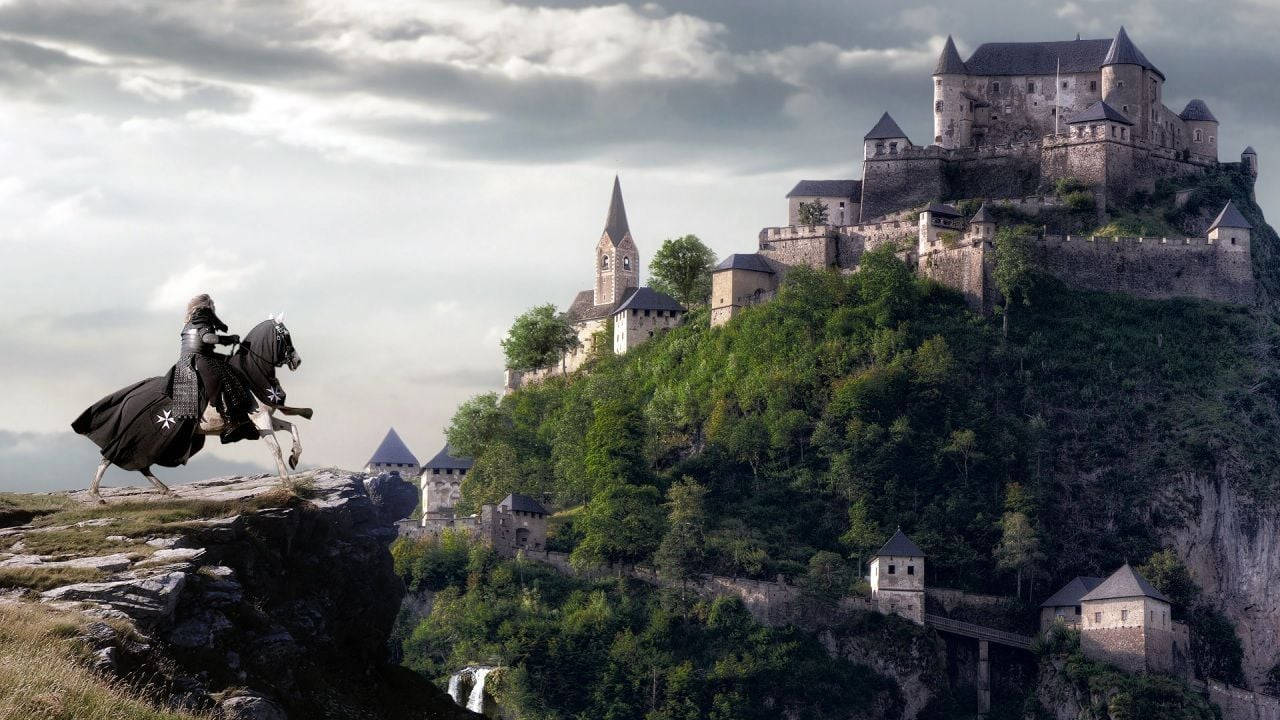 A Man Riding A Horse On A Cliff Near A Castle Background