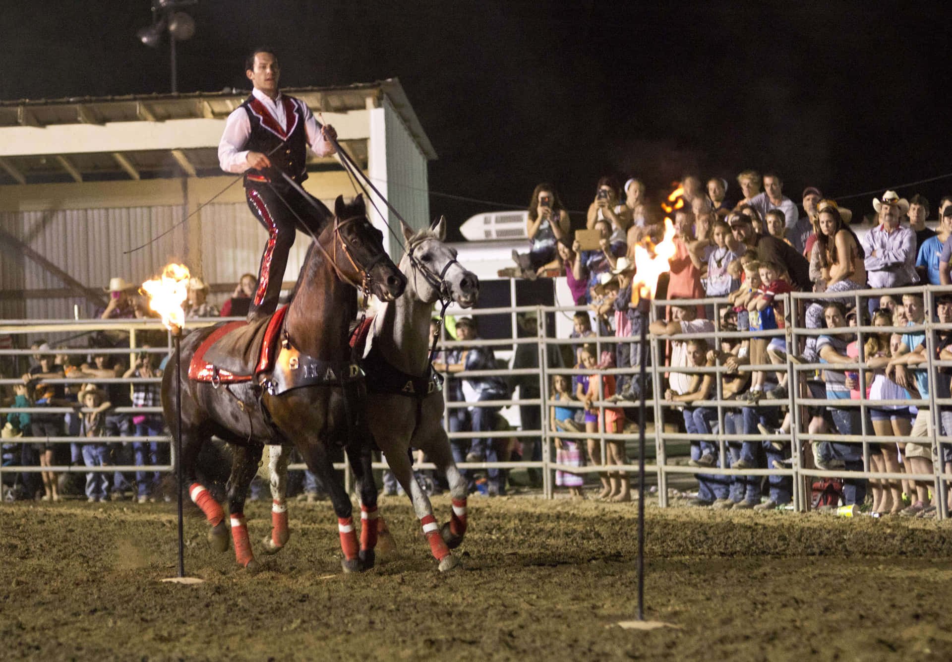 A Man Riding A Horse With A Fire In His Mouth Background