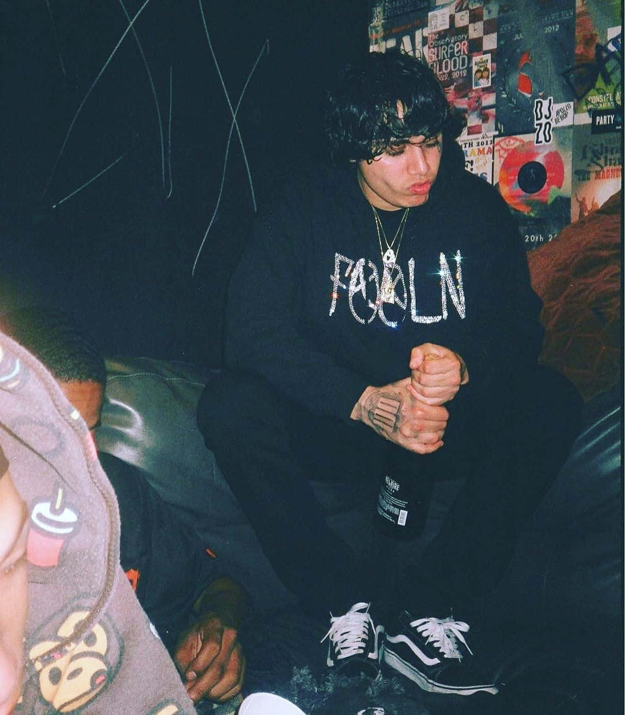 A Man Sitting On A Couch