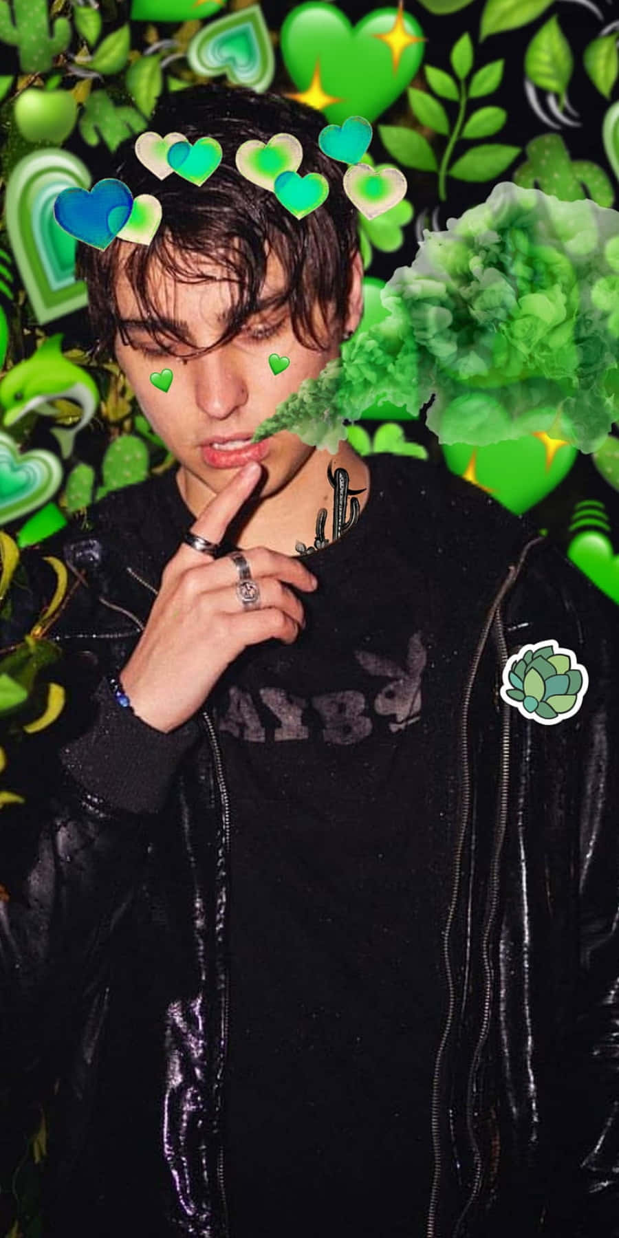 A Man Smoking A Cigarette In Front Of Green Hearts Background