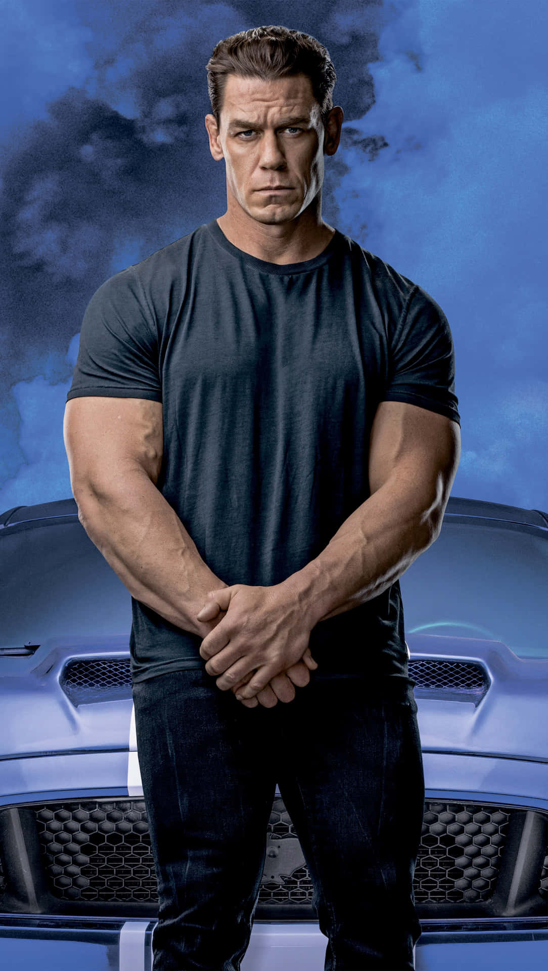 A Man Standing In Front Of A Blue Car Background