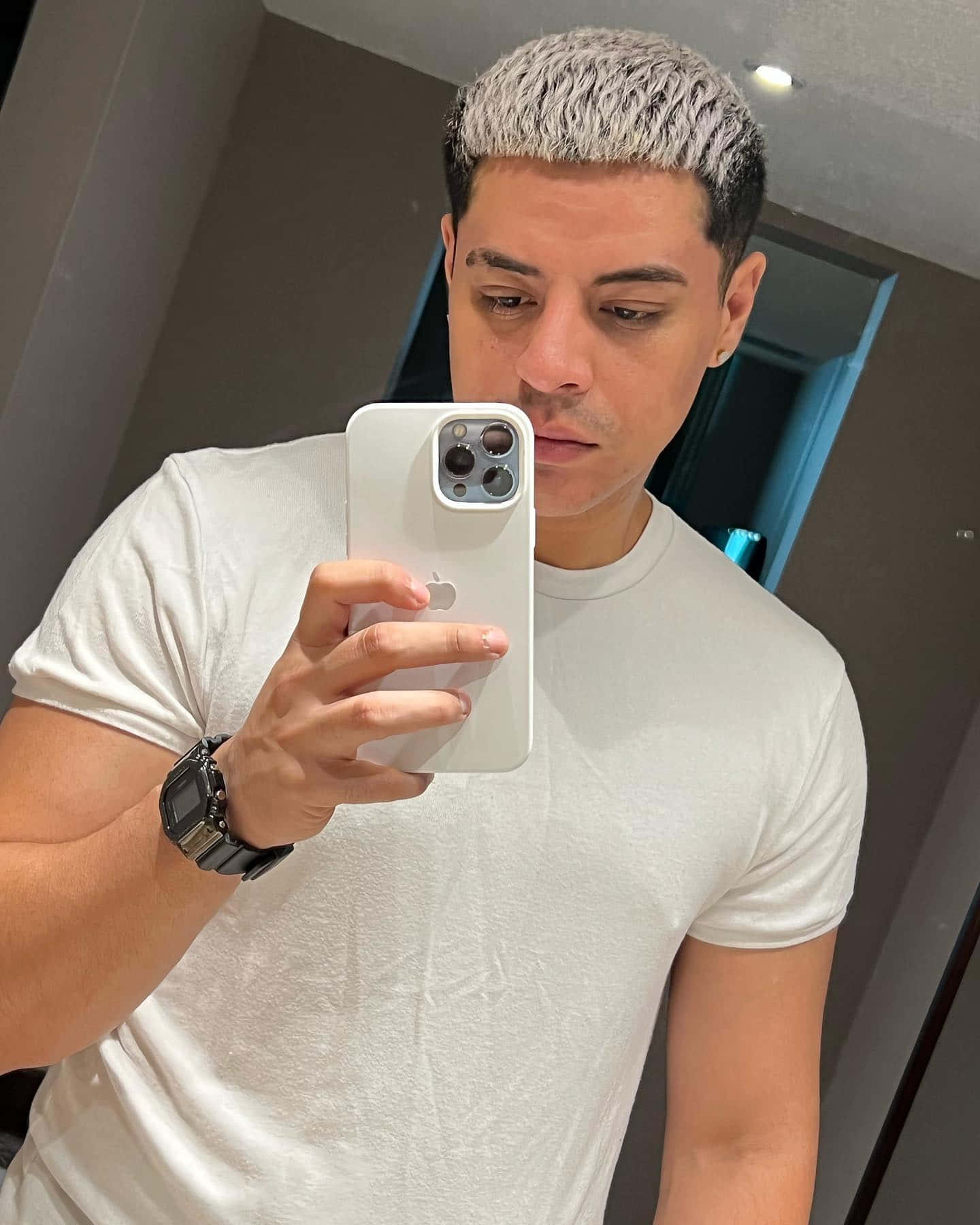 A Man Taking A Selfie With His Phone Background