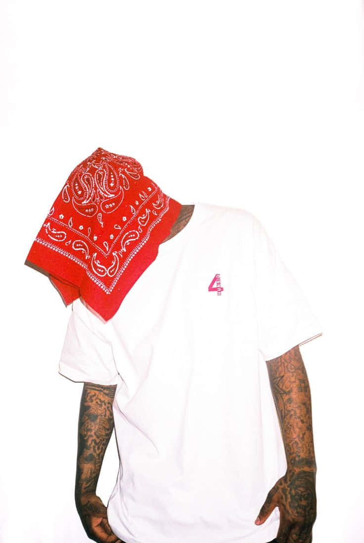 A Man With A Bandana On His Head Background