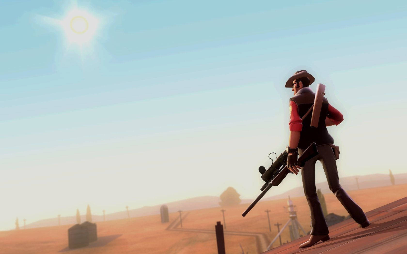 A Man With A Gun Is Standing On A Hill Background