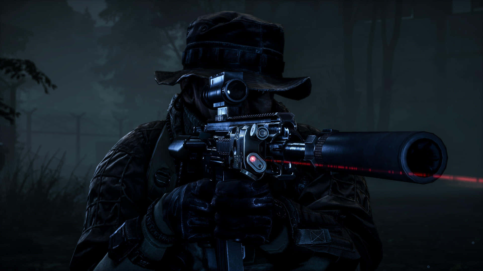 A Man With A Rifle In The Dark Background