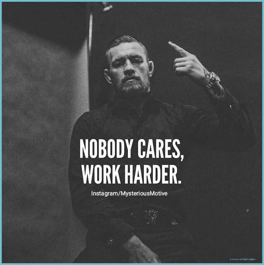 A Man With A Ring On His Hand With The Words Nobody Cares Work Harder Background
