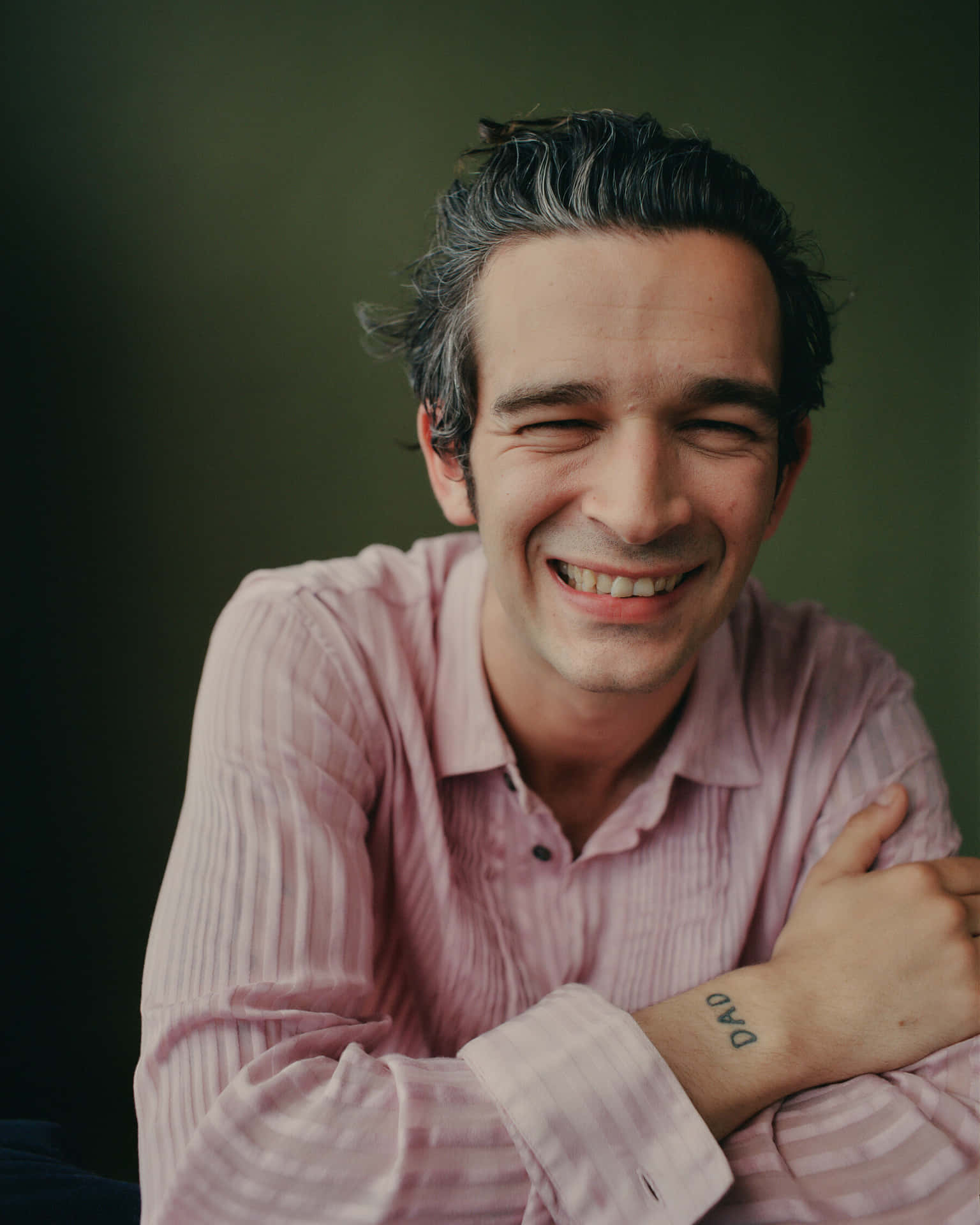 A Man With A Tattoo Background