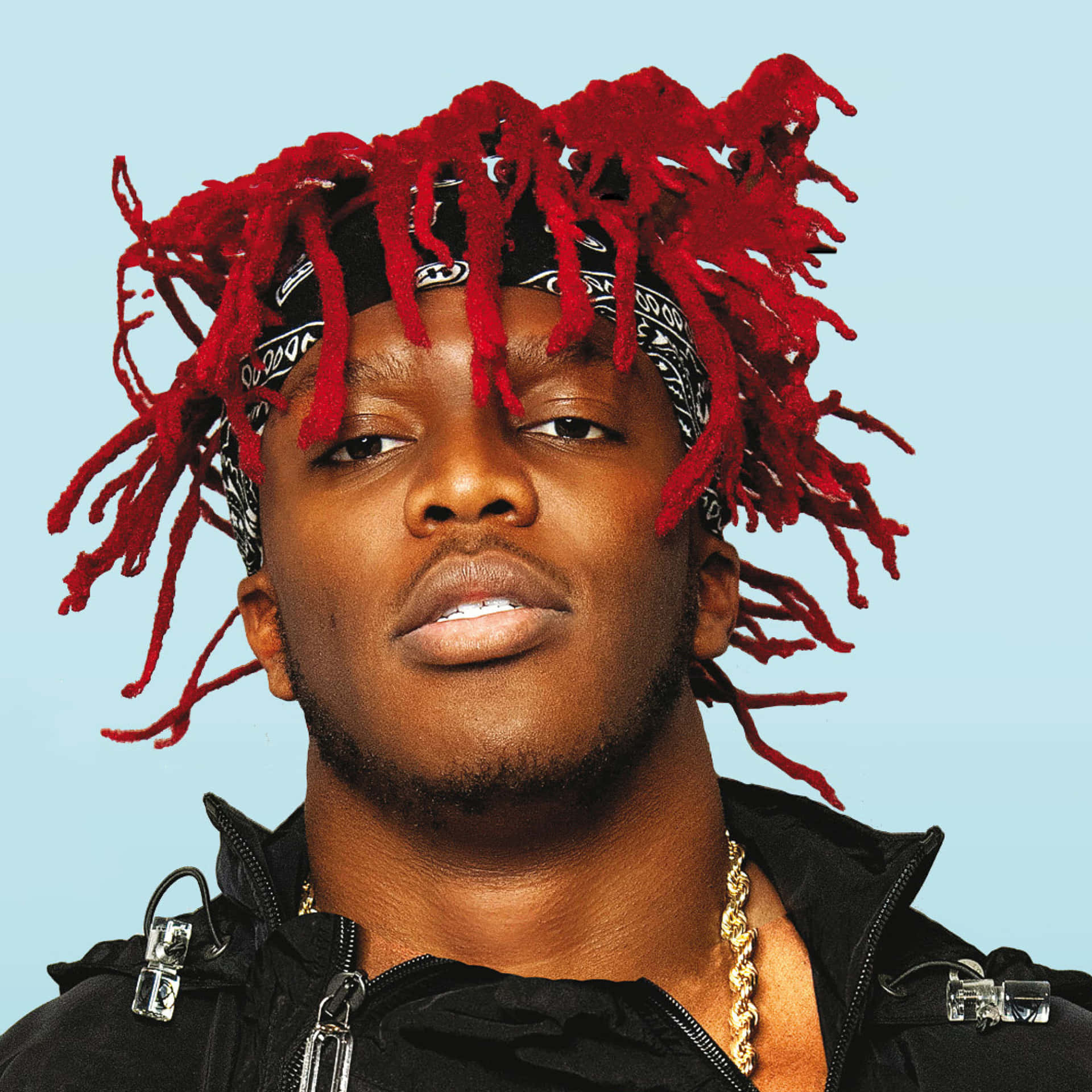 A Man With Red Dreadlocks And A Black Jacket Background