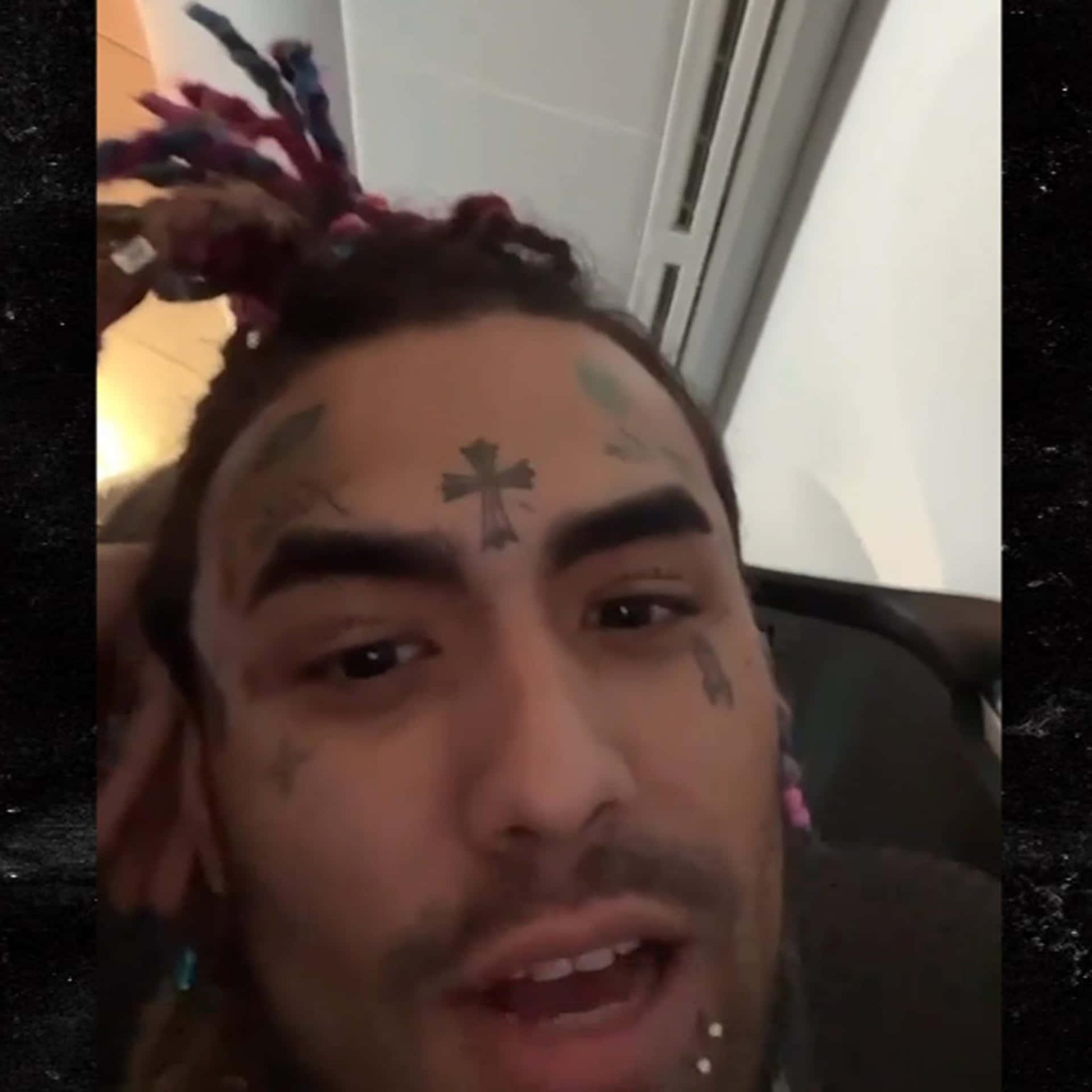A Man With Tattoos On His Face