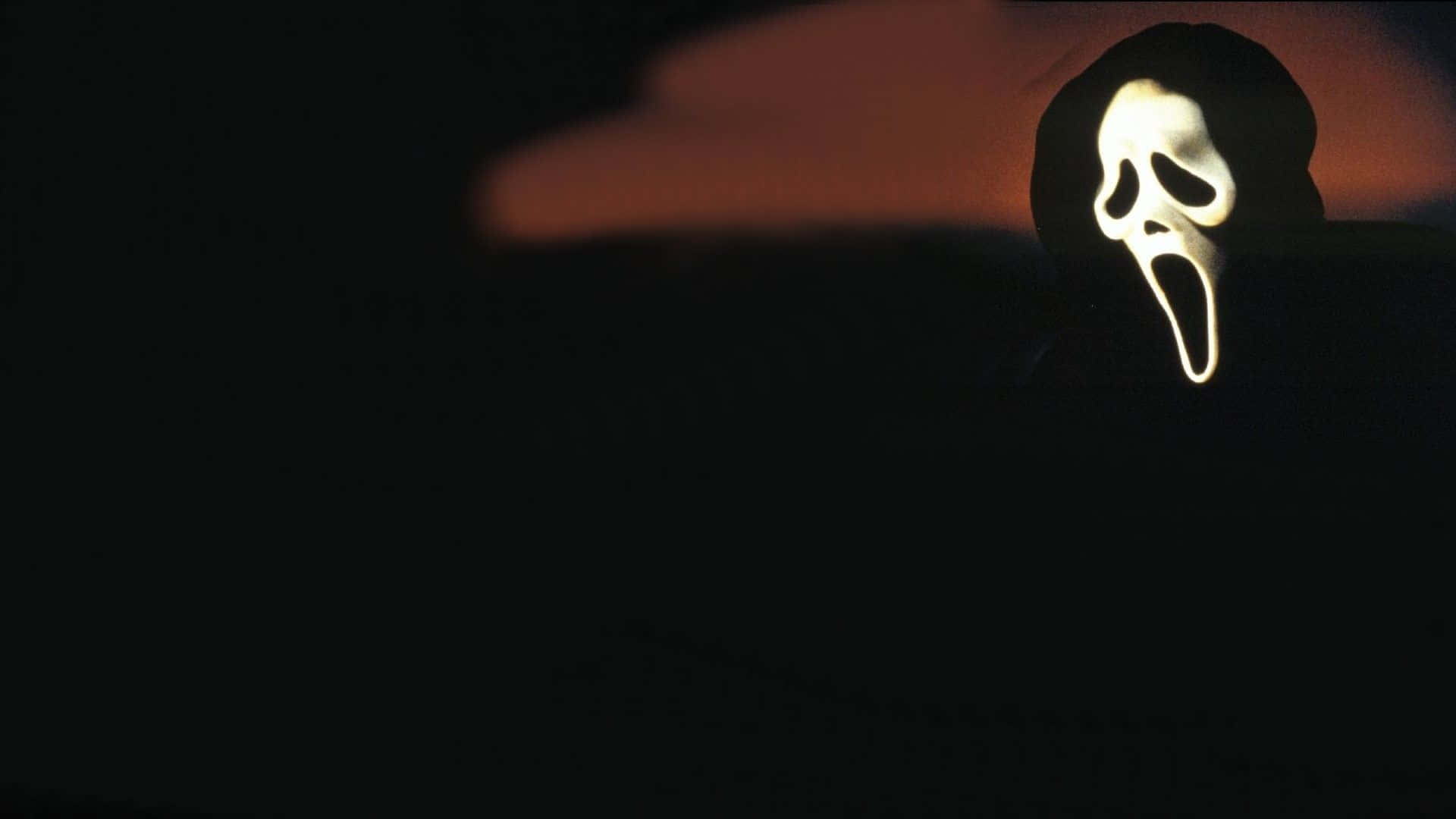A Menacing Figure Looms In The Shadows. Background