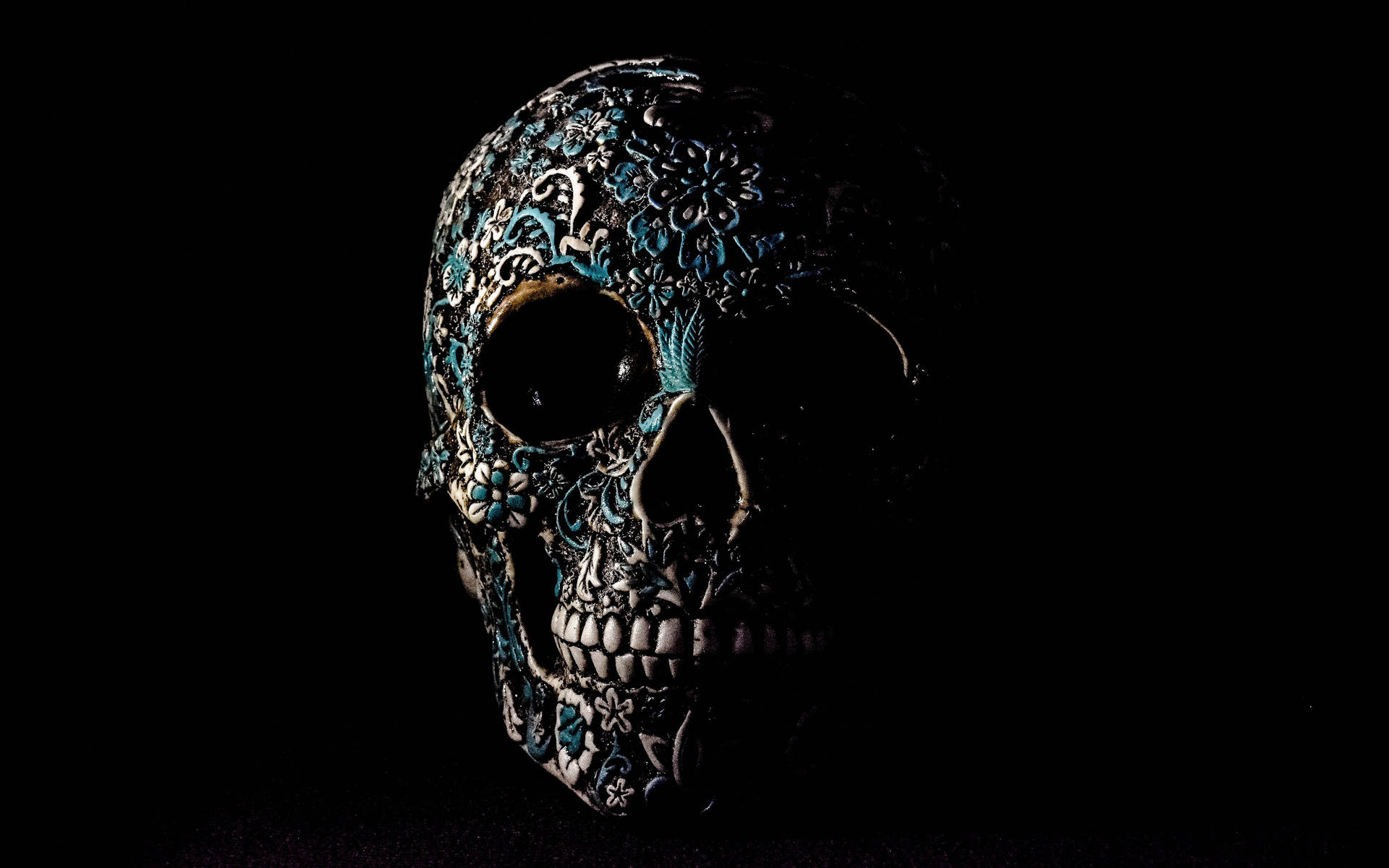 A Menacing Skull Made Of Black Stone Background