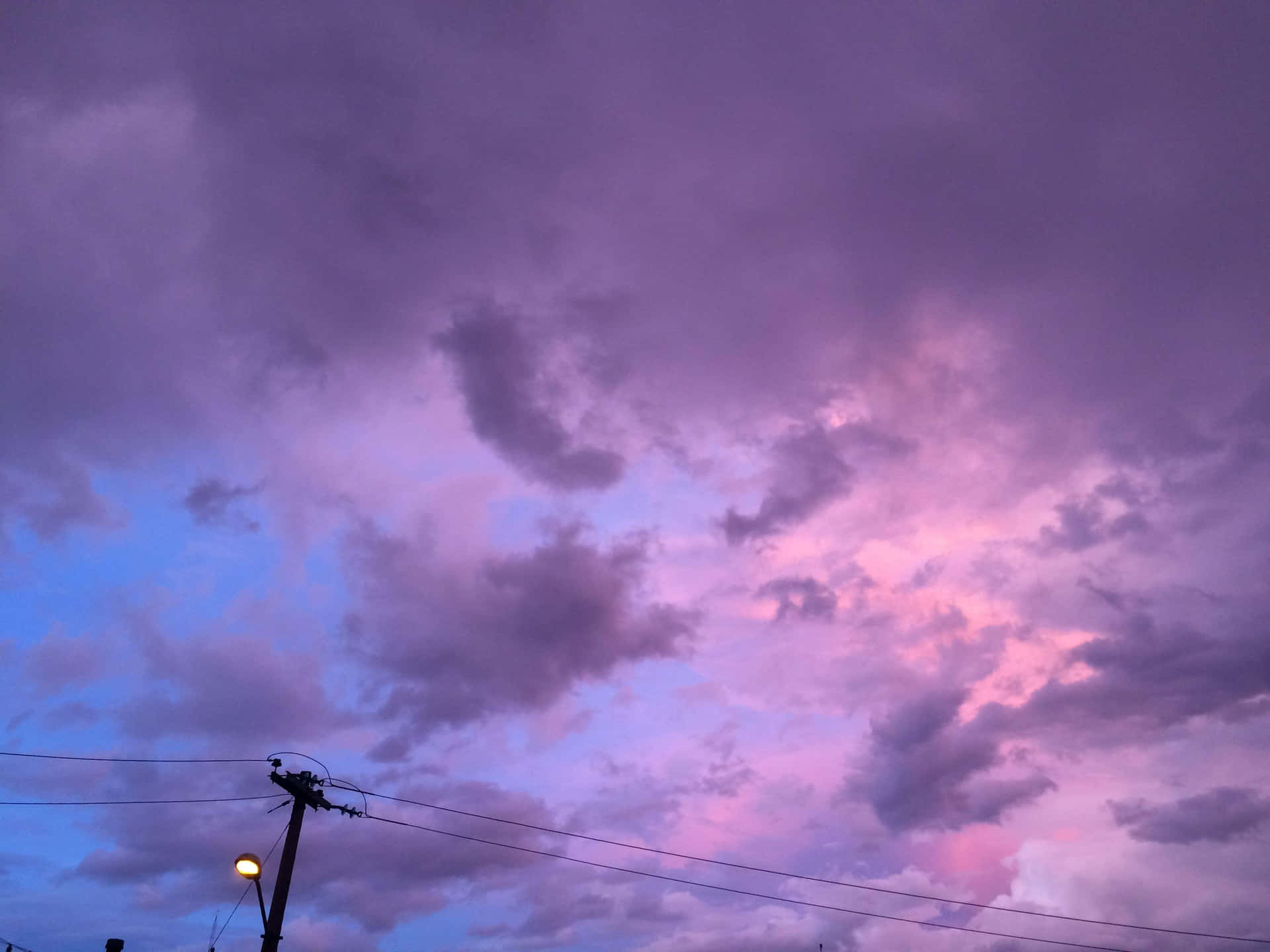 A Mesmerizing Composition Of Pastel Shades Of Pink And Purple. Background