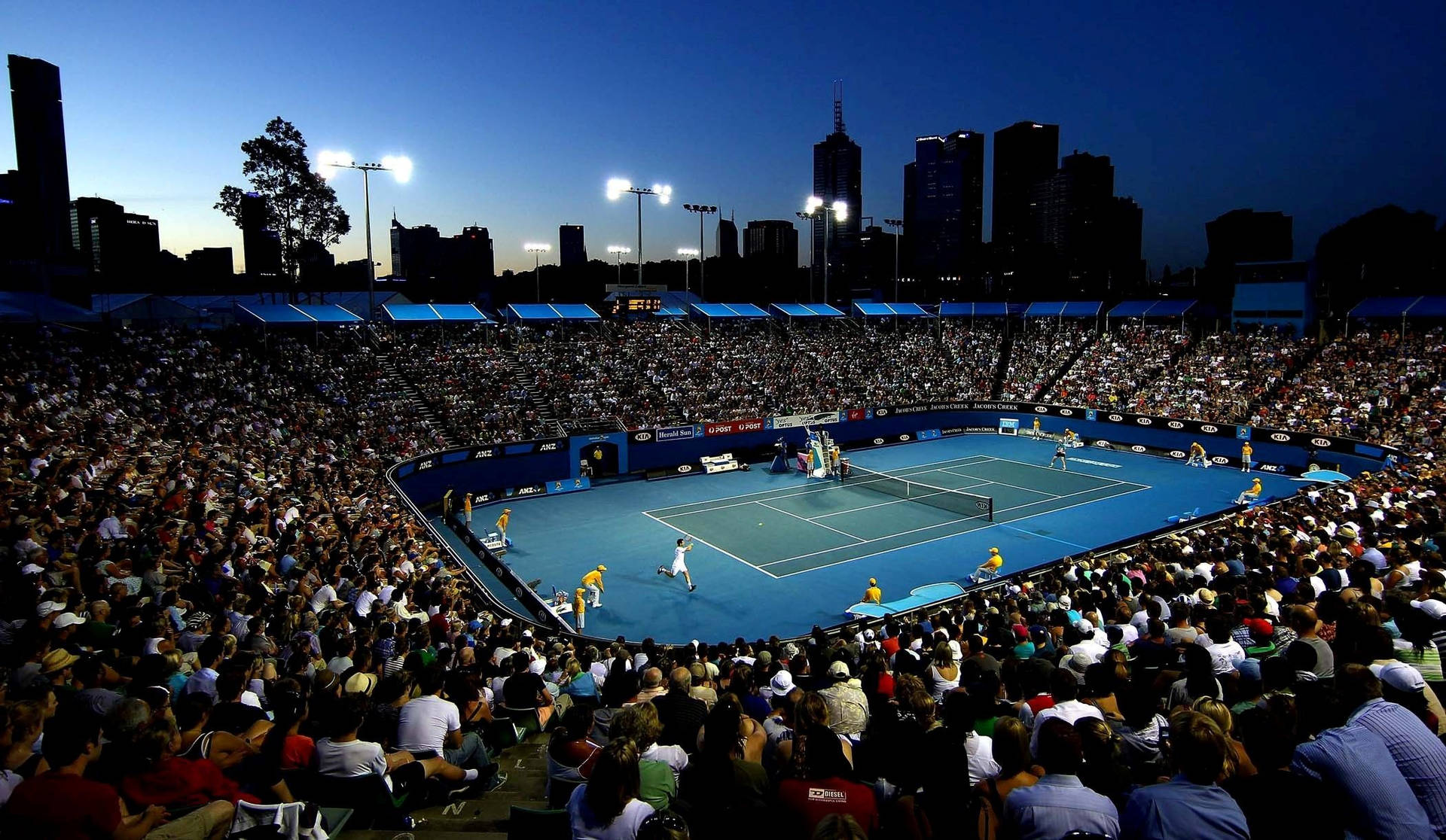 A Mesmerizing Evening At The Australian Open Tennis Court Background