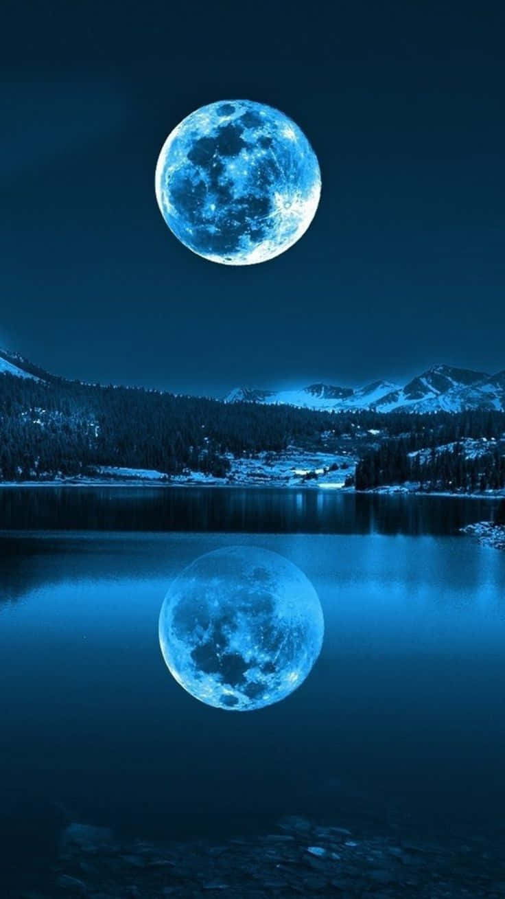 A Mesmerizing Photo Of The Moon Through An Iphone Lens Background