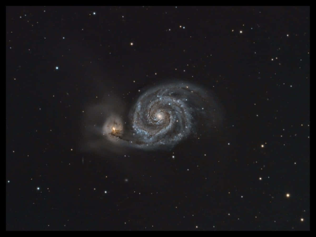 A Mesmerizing View Of The Whirlpool Galaxy Background