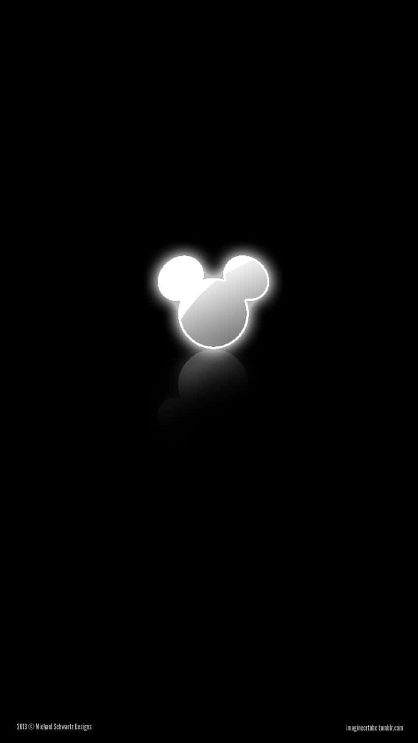 A Mickey Mouse Logo On A Black Background Background