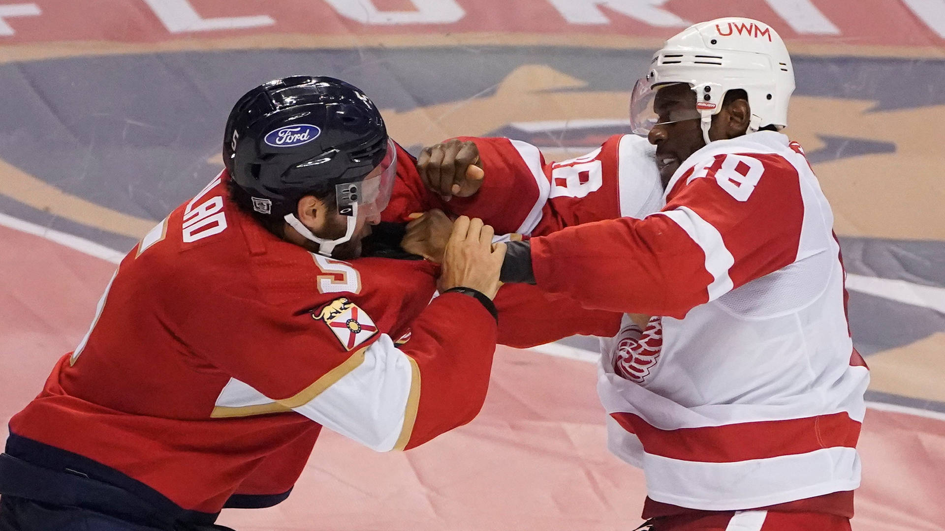 A Mighty Clash On Ice: Aaron Ekblad Versus Givani Smith Background