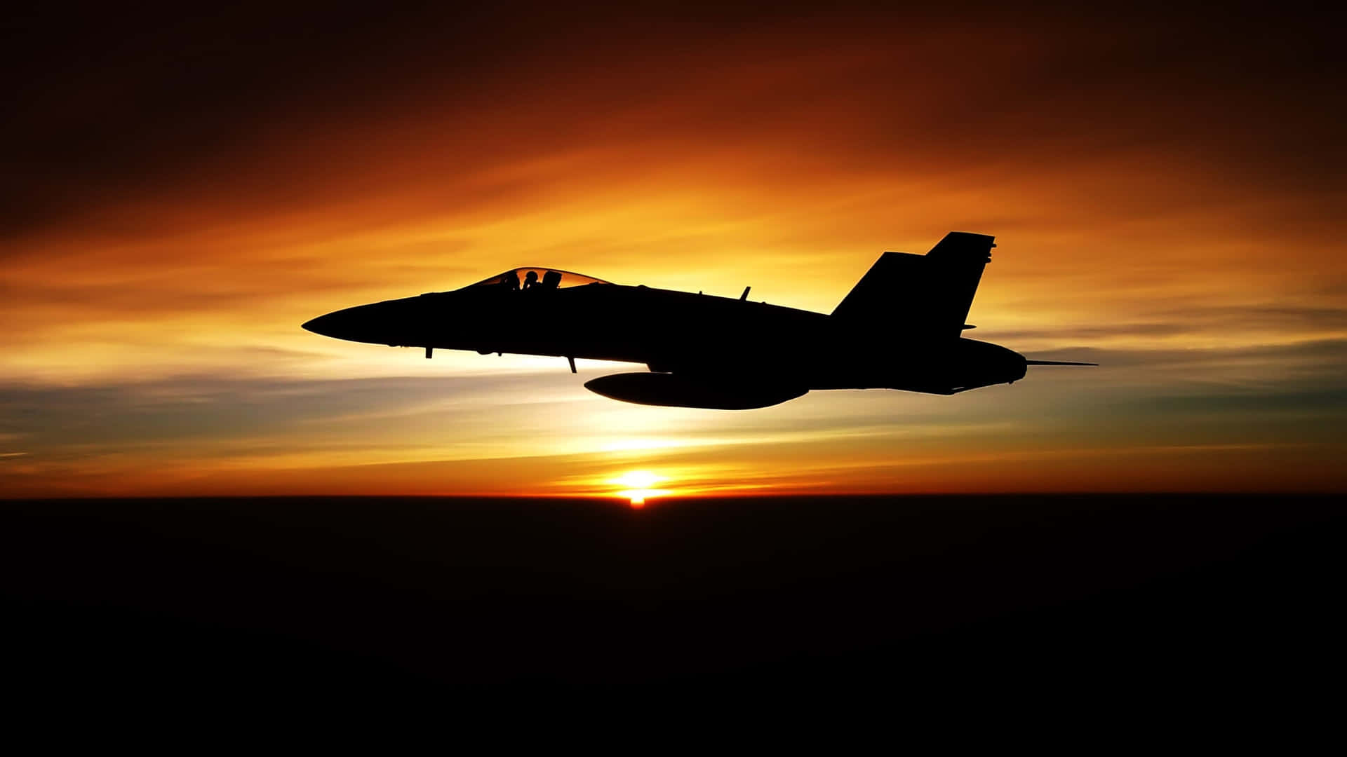 A Military Plane Soaring In The Sky With American Flags Background