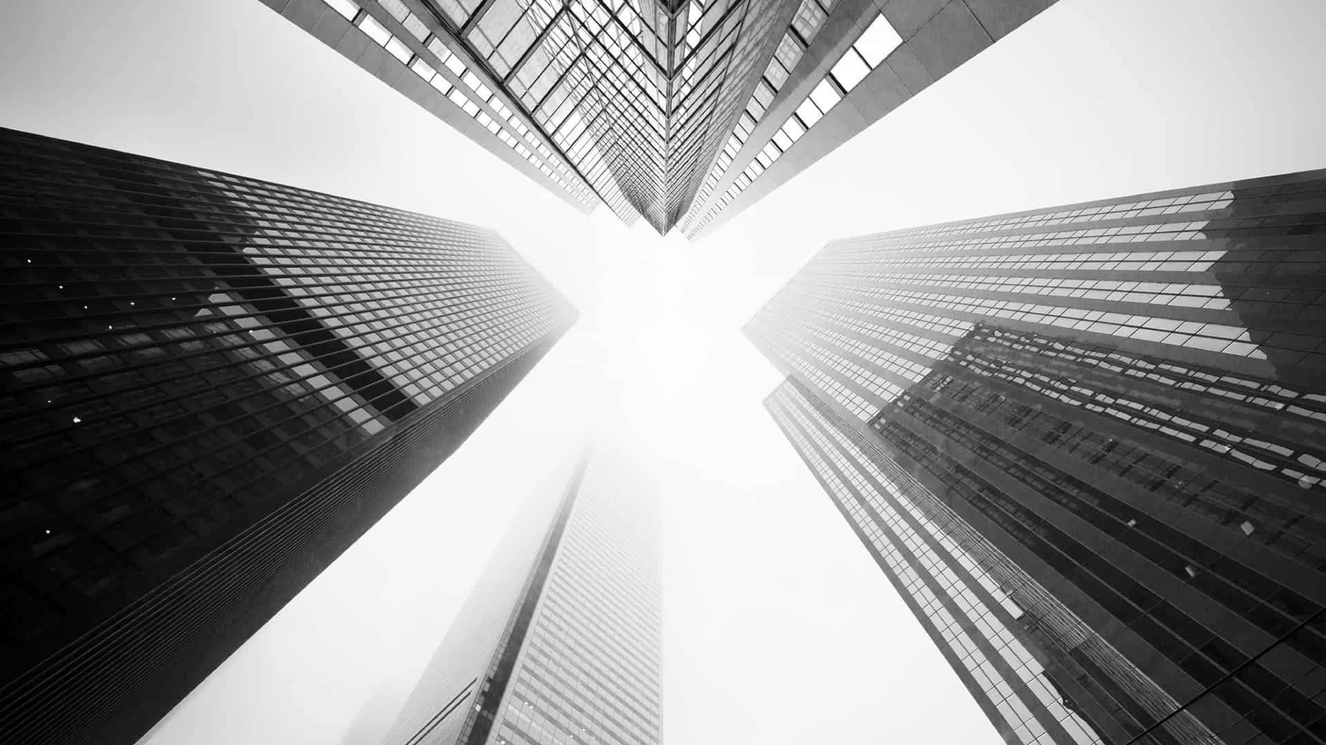A Minimalist And Sleek Laptop Sitting On A White Background, Perfect For Your Daily Tasks. Background