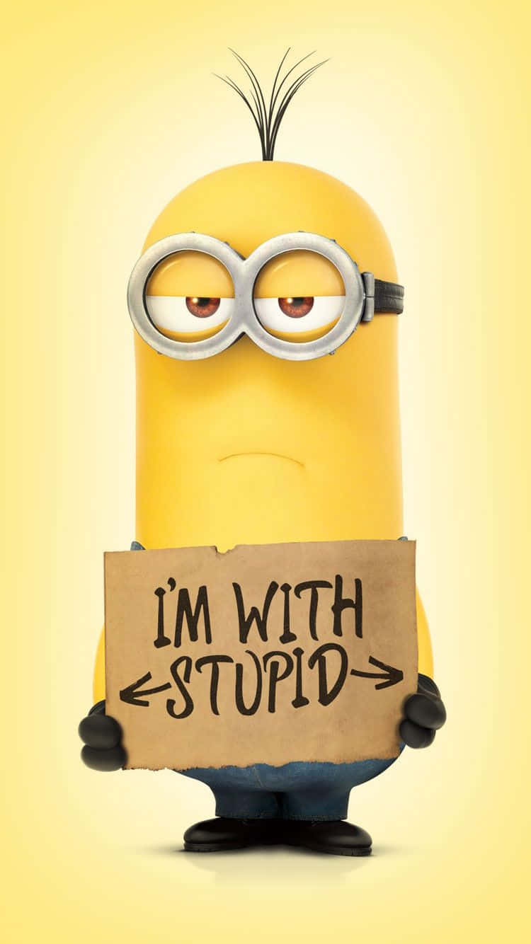 A Minion Holding A Sign That Says I'm With Stupid Background