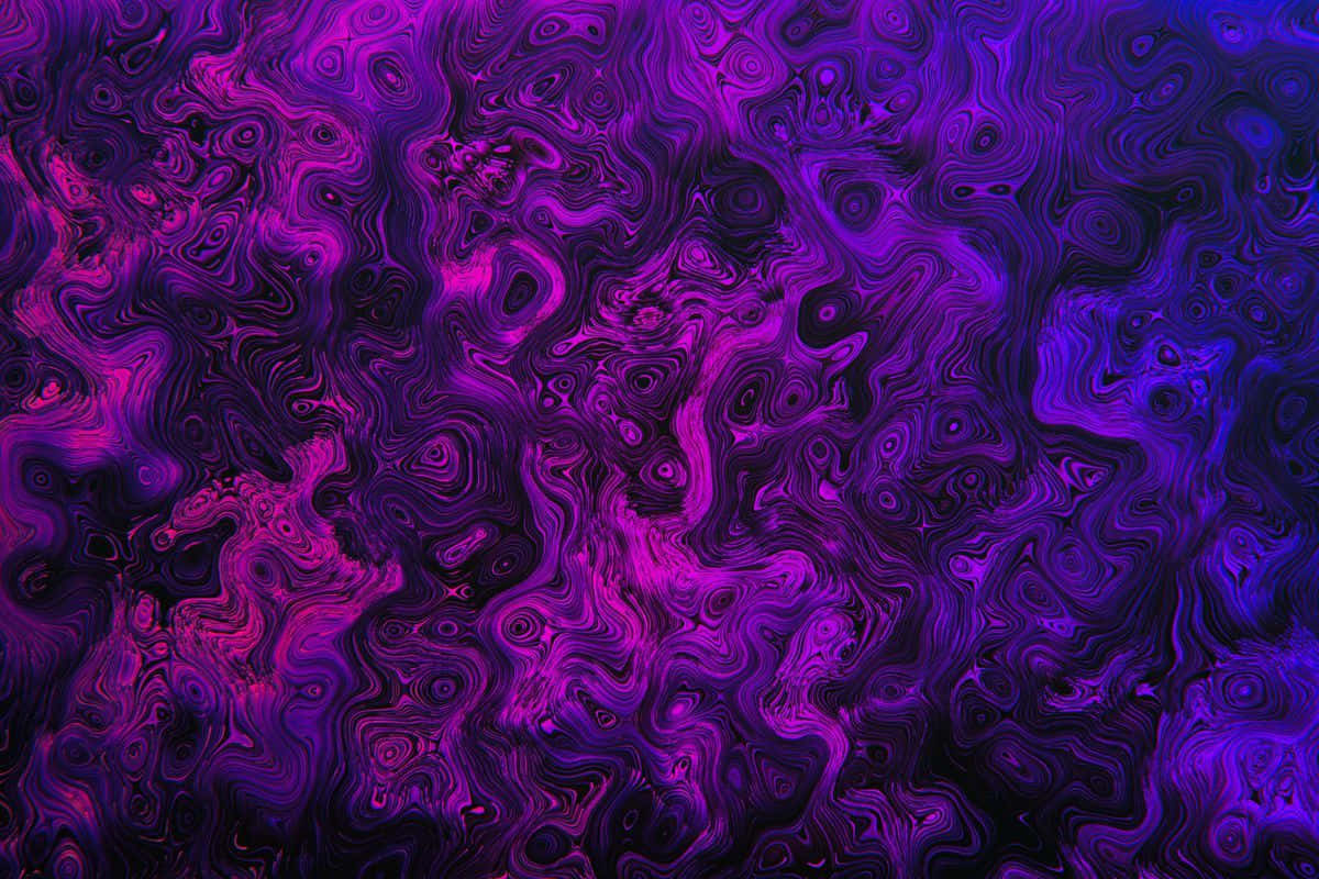 A Modern Purple Laptop On A Desk