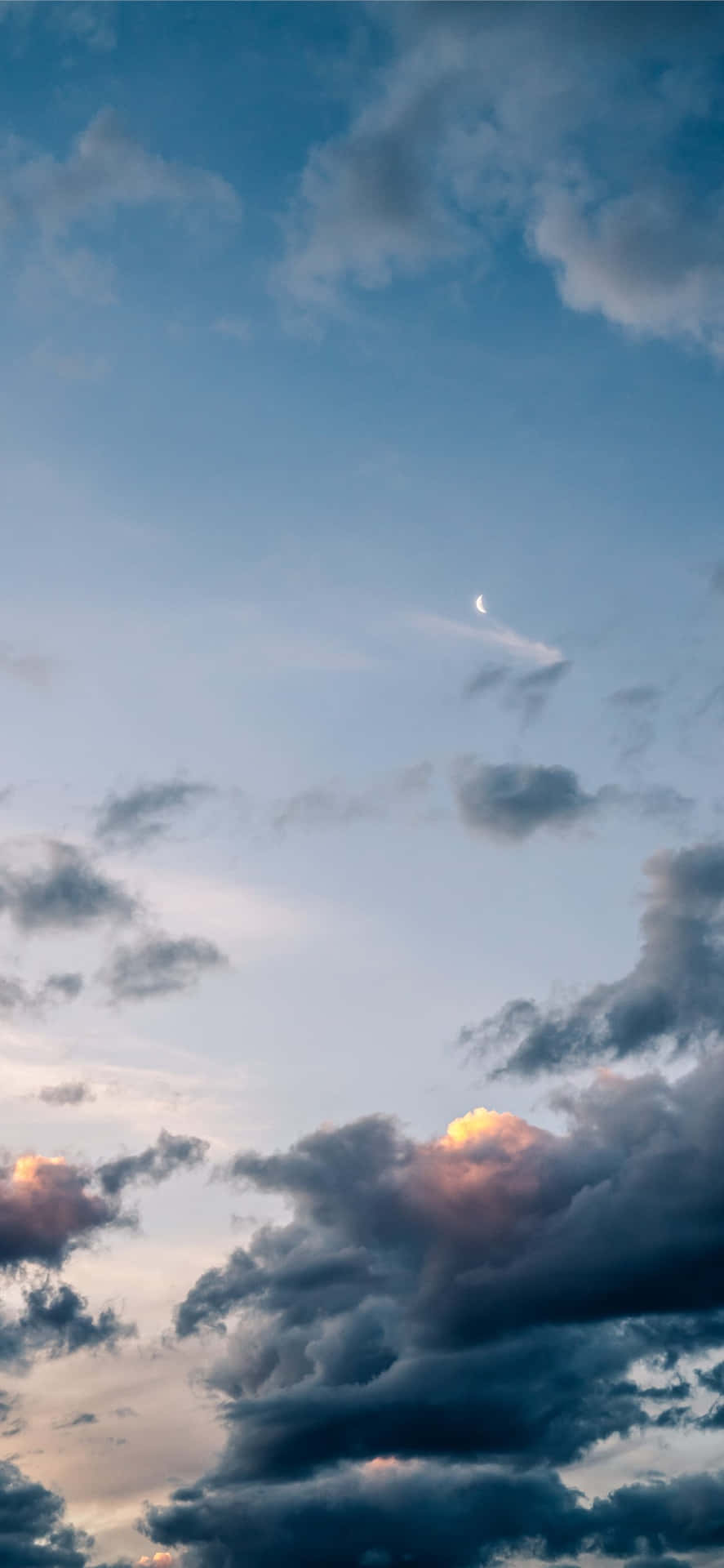 A Moon And Clouds In The Sky