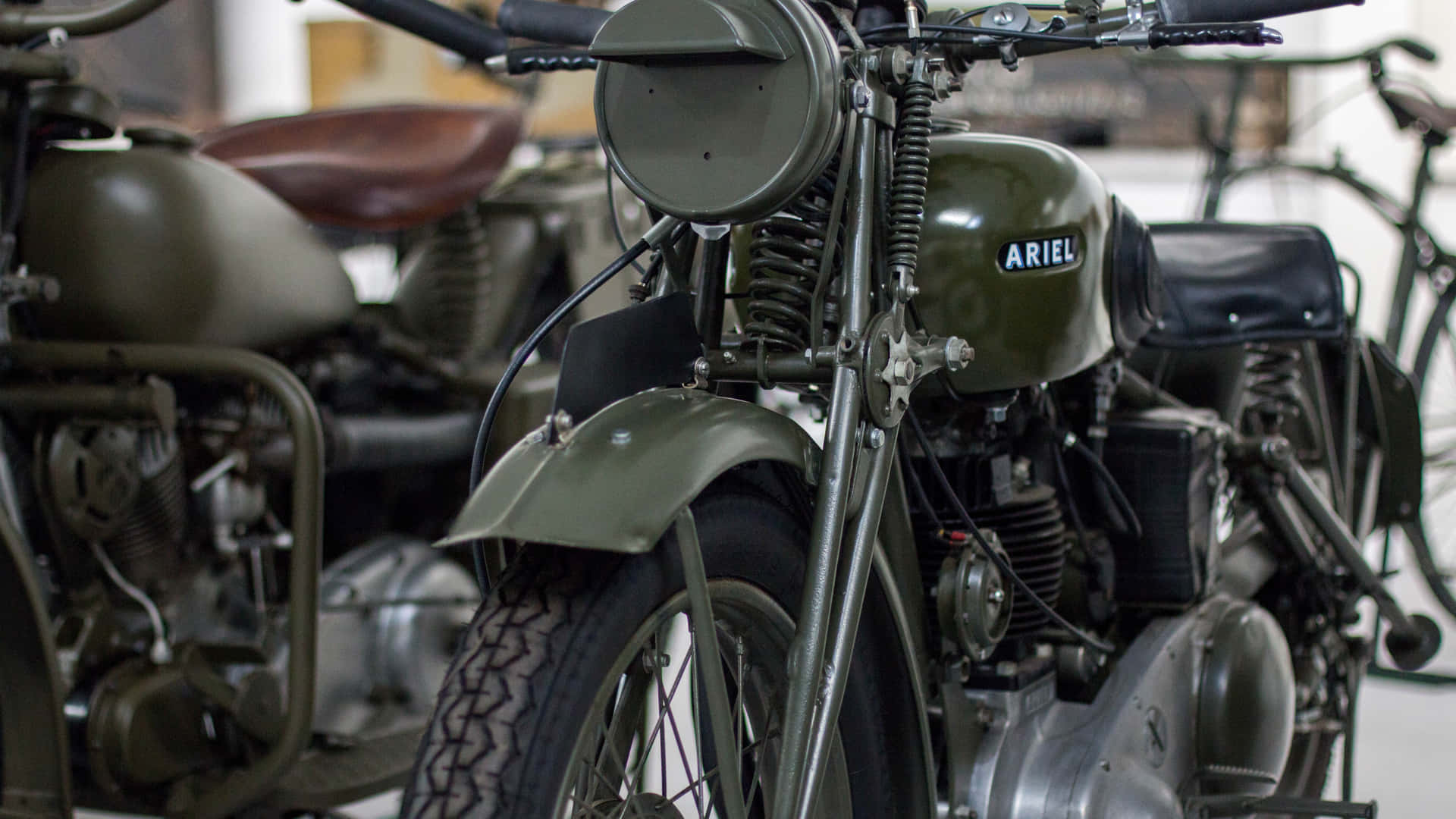 A Motorcycle Is Parked In A Room Background