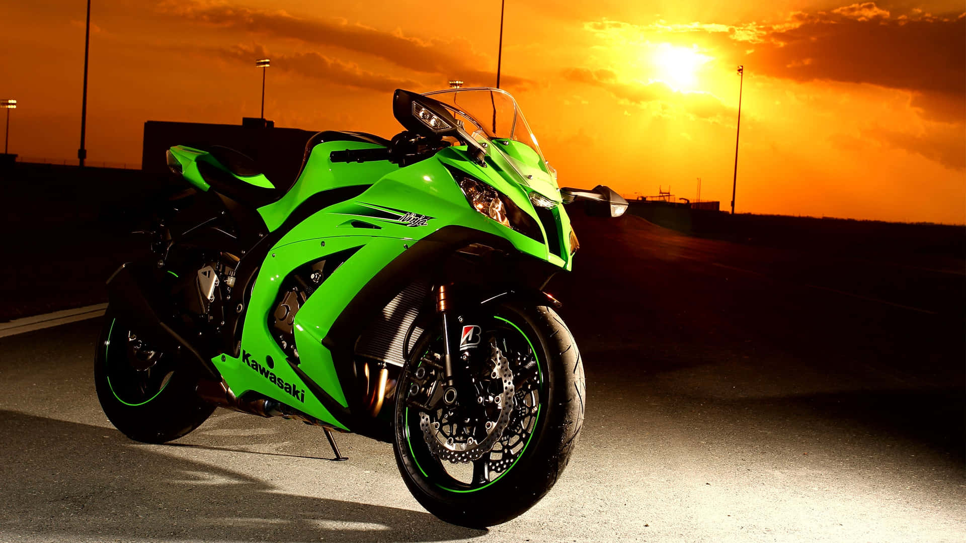 A Motorcycle Parked On The Road Background