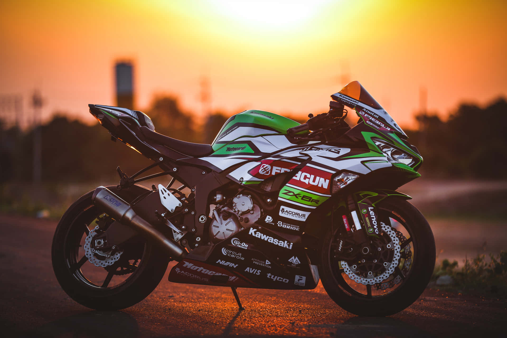 A Motorcycle Parked On The Road Background