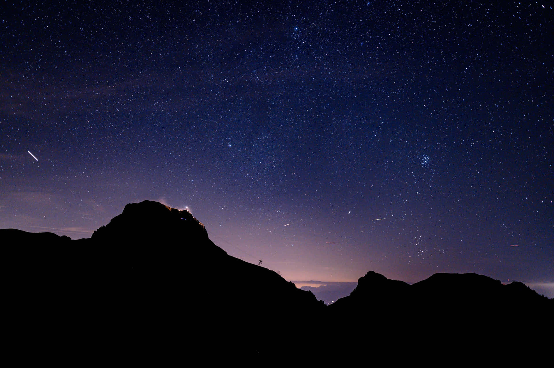 A Mountain Range In The Sky Background