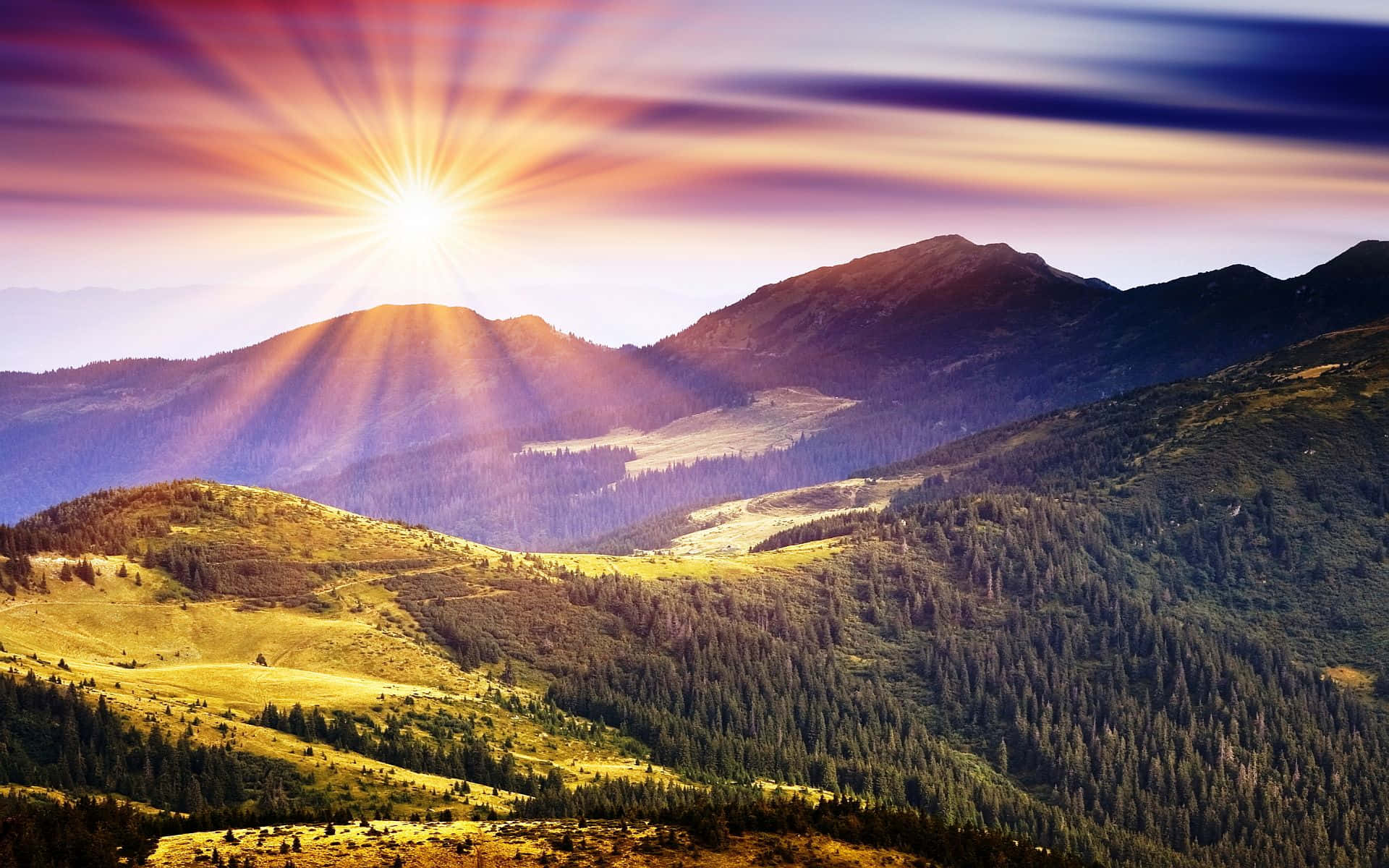 A Mountain Range With The Sun Rising Over It Background