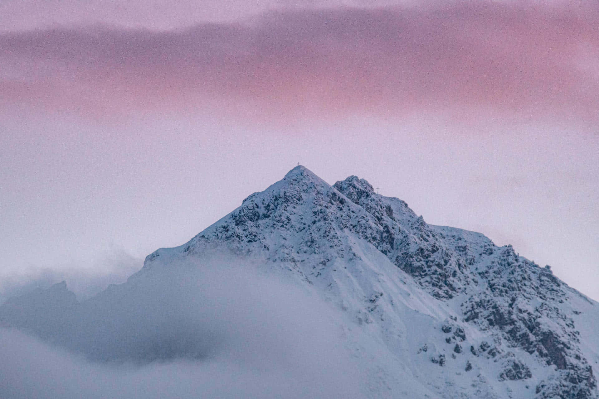 A Mountain With A Cloudy Sky Background