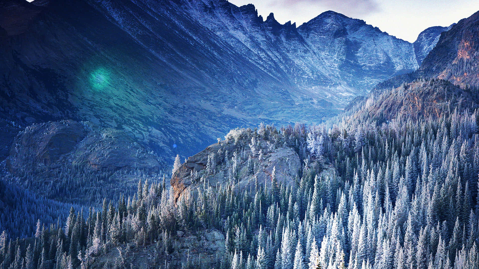 A Mountain With Trees Background