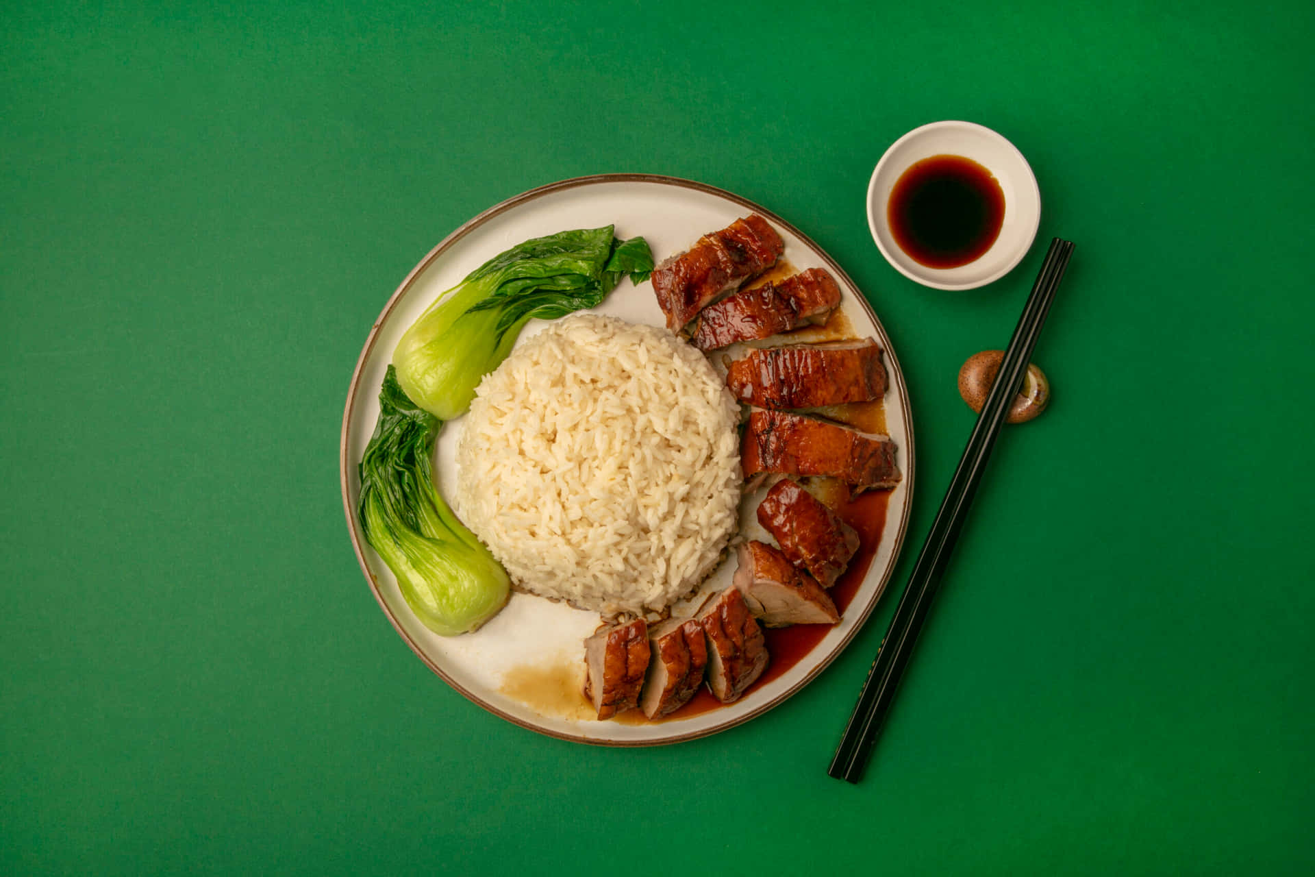 A Mouthwatering Plate Of Duck Rice Background