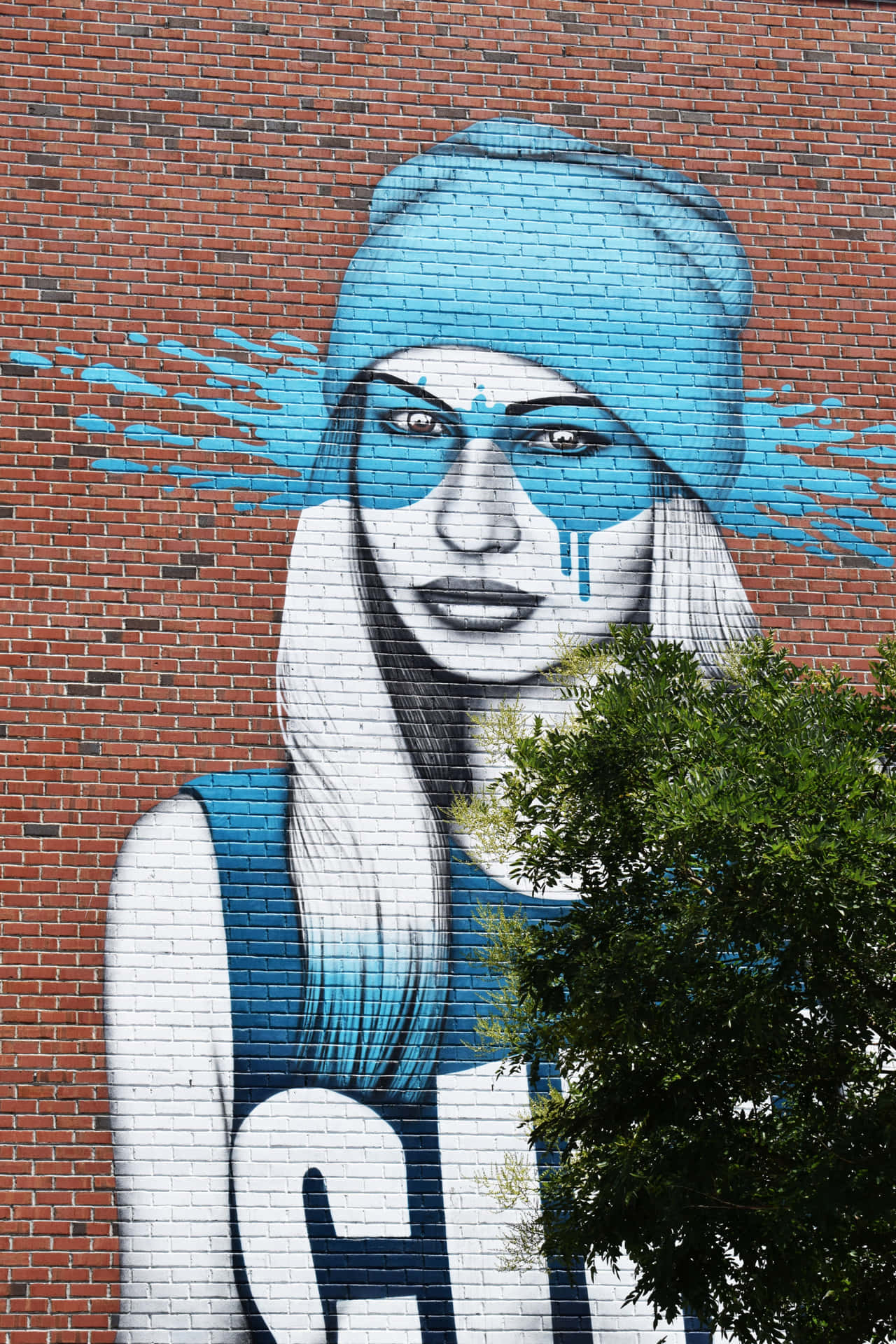 A Mural Of A Girl With A Blue Hat Background