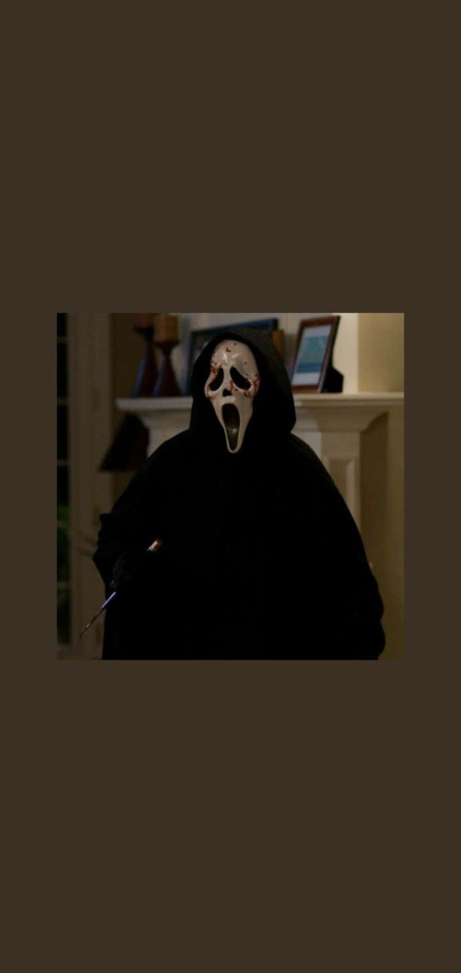 A Mysterious Ghostface In The Dark Background