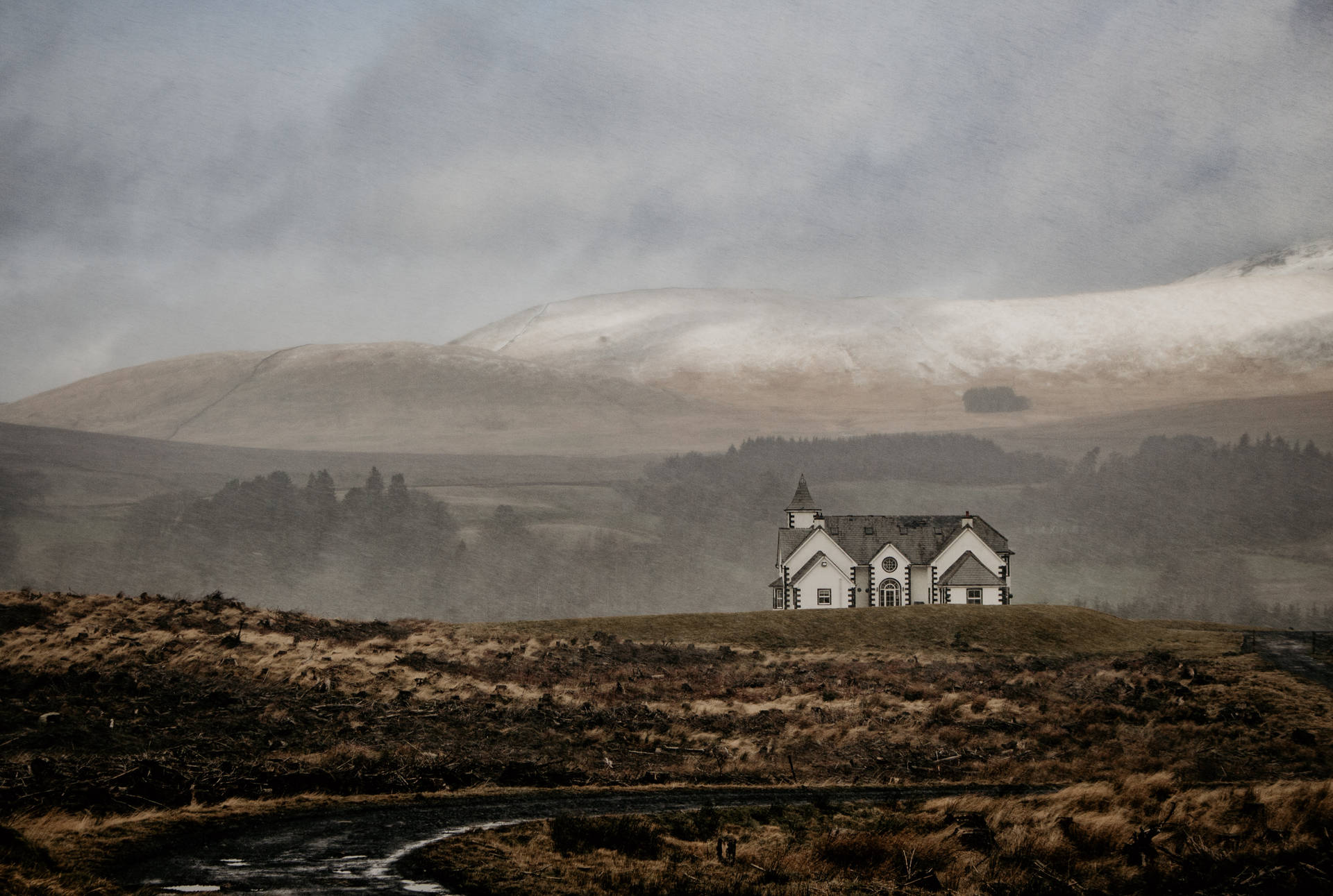 A Mystical Valley Framed By A Dense Fog And A Silent Castle Background