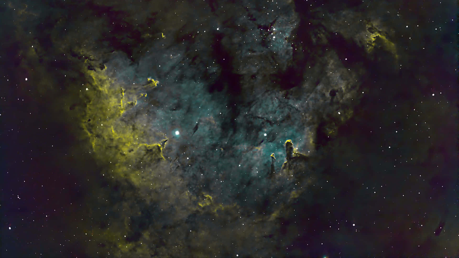 A Nebula With Stars And Green And Yellow Background