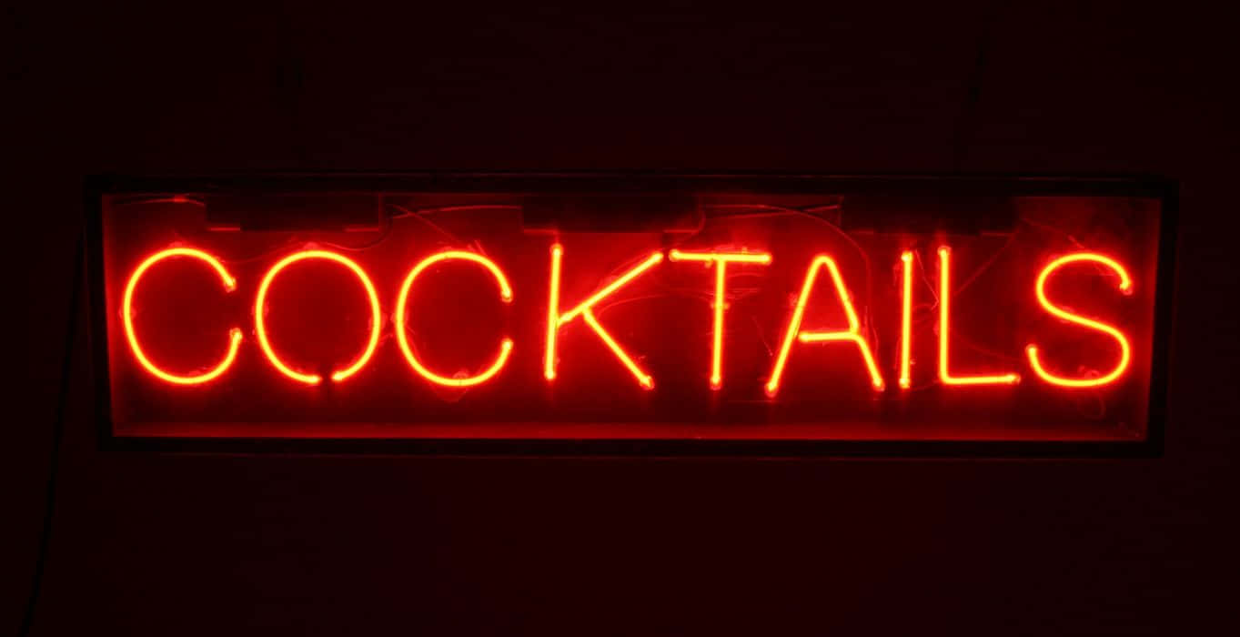 A Neon Sign That Says Cocktails Background