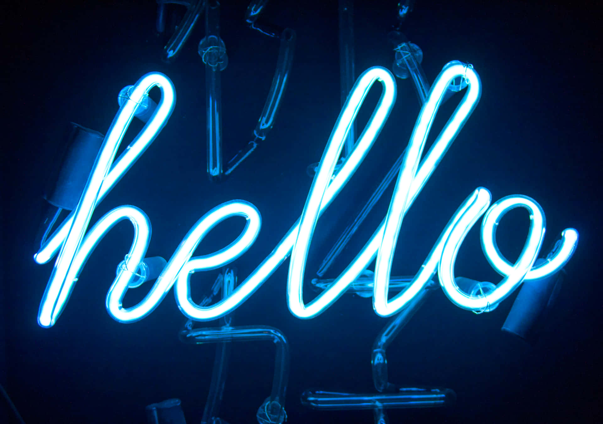 A Neon Sign That Says Hello Background