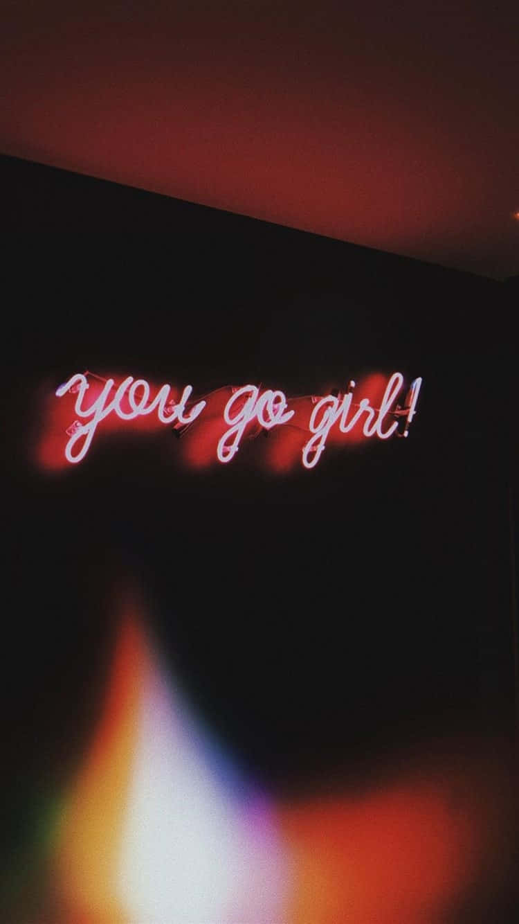 A Neon Sign That Says You Go Girl Background
